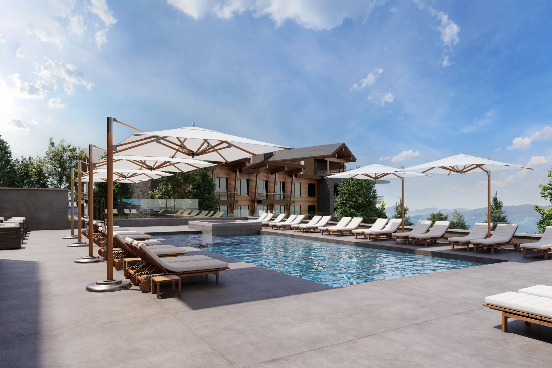 Outdoor swimming pool with integrated spa, bordered by a concrete deck