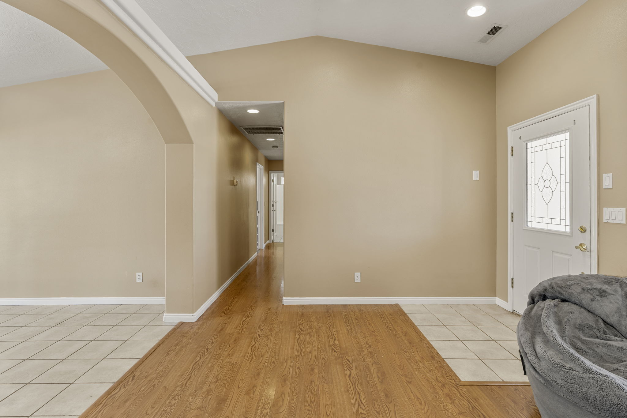 Vaulted ceilings complement the neutral paint finishes
