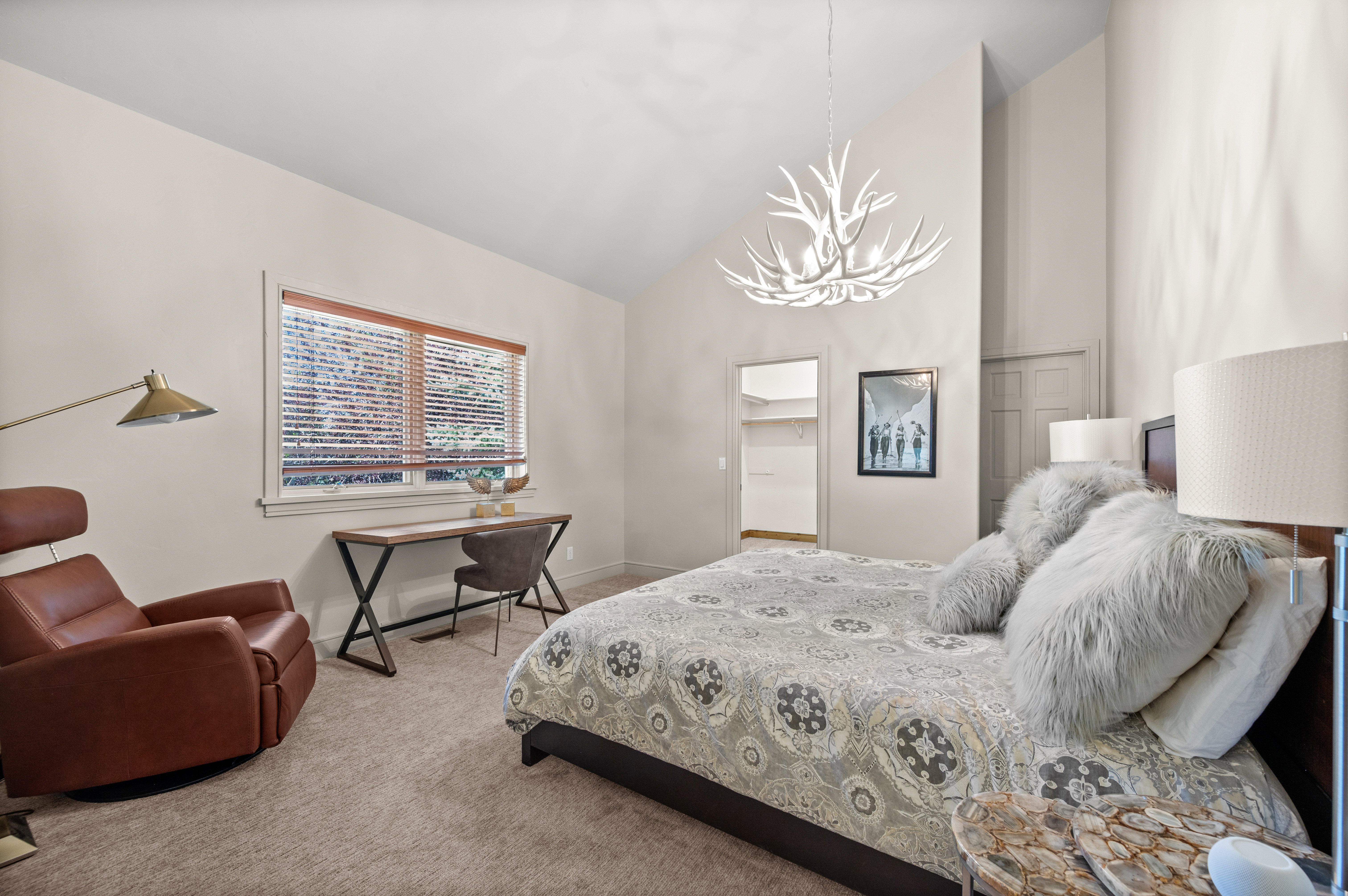 Vaulted ceiling with an antler-style chandelier
