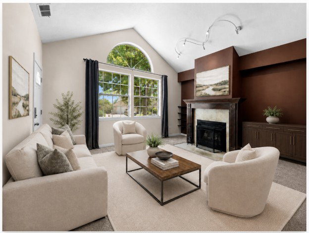 Vaulted ceiling living area featuring a fireplace with a wood mantle, an arched window, and a built-in credenza