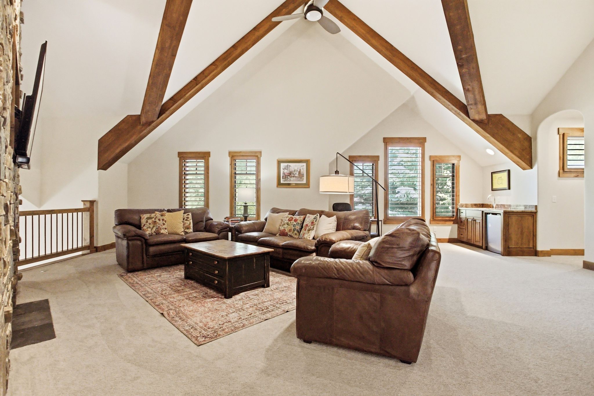 Vaulted ceiling with exposed wood beams