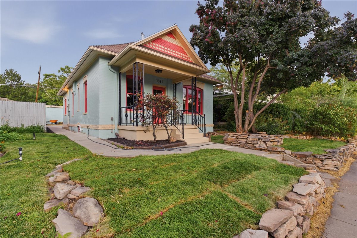 Light blue exterior with red trim accents