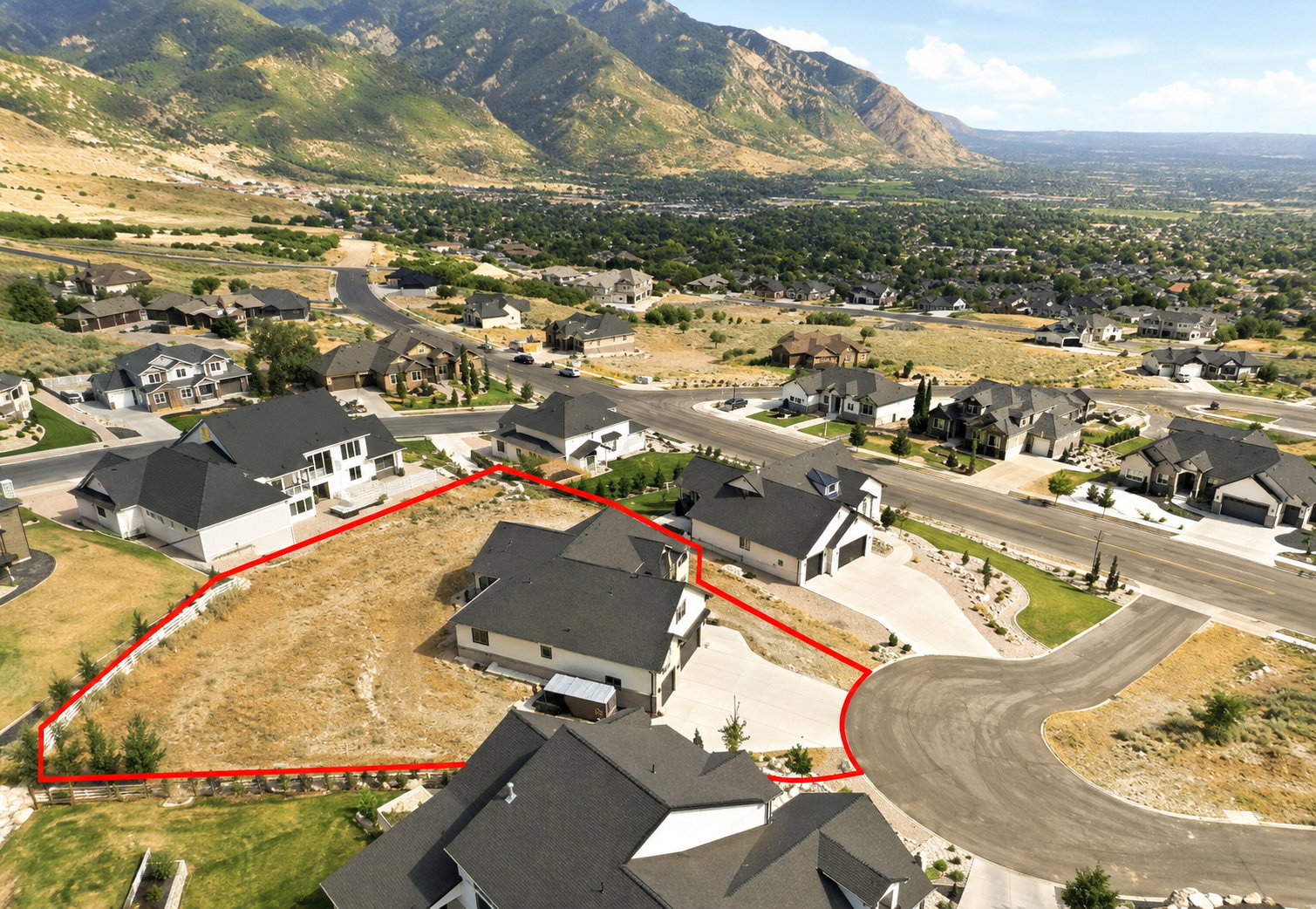 Expansive residential building lot with mountain backdrop .56 are lot