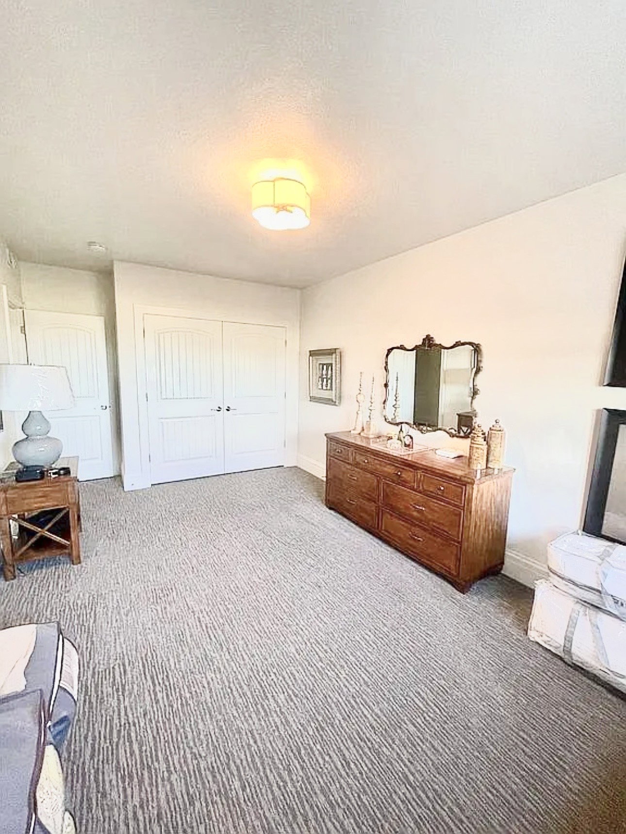 Neutral-toned patterned carpeting providing textural interest