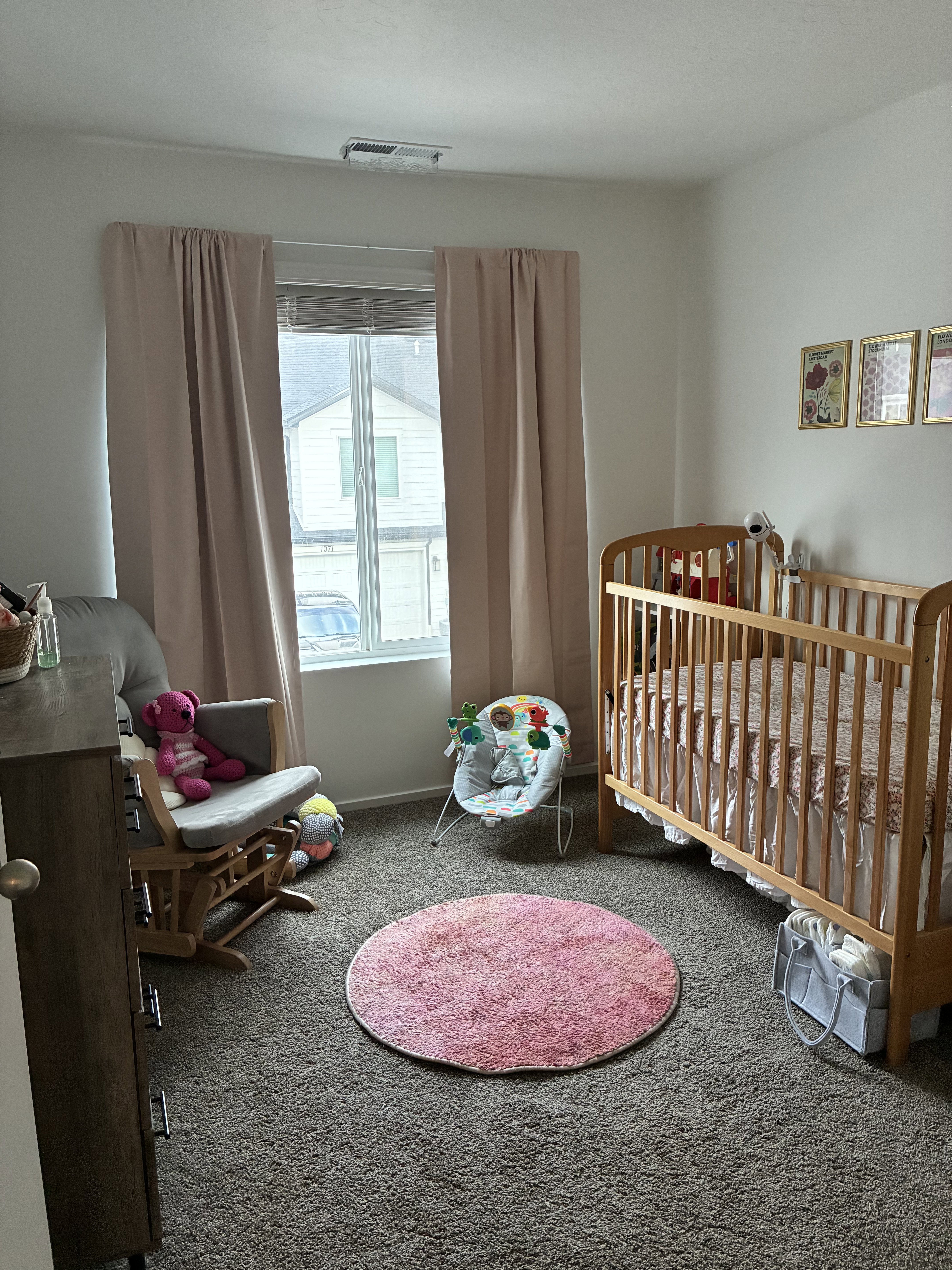 Bright room with neutral wall finishes and plush carpeting