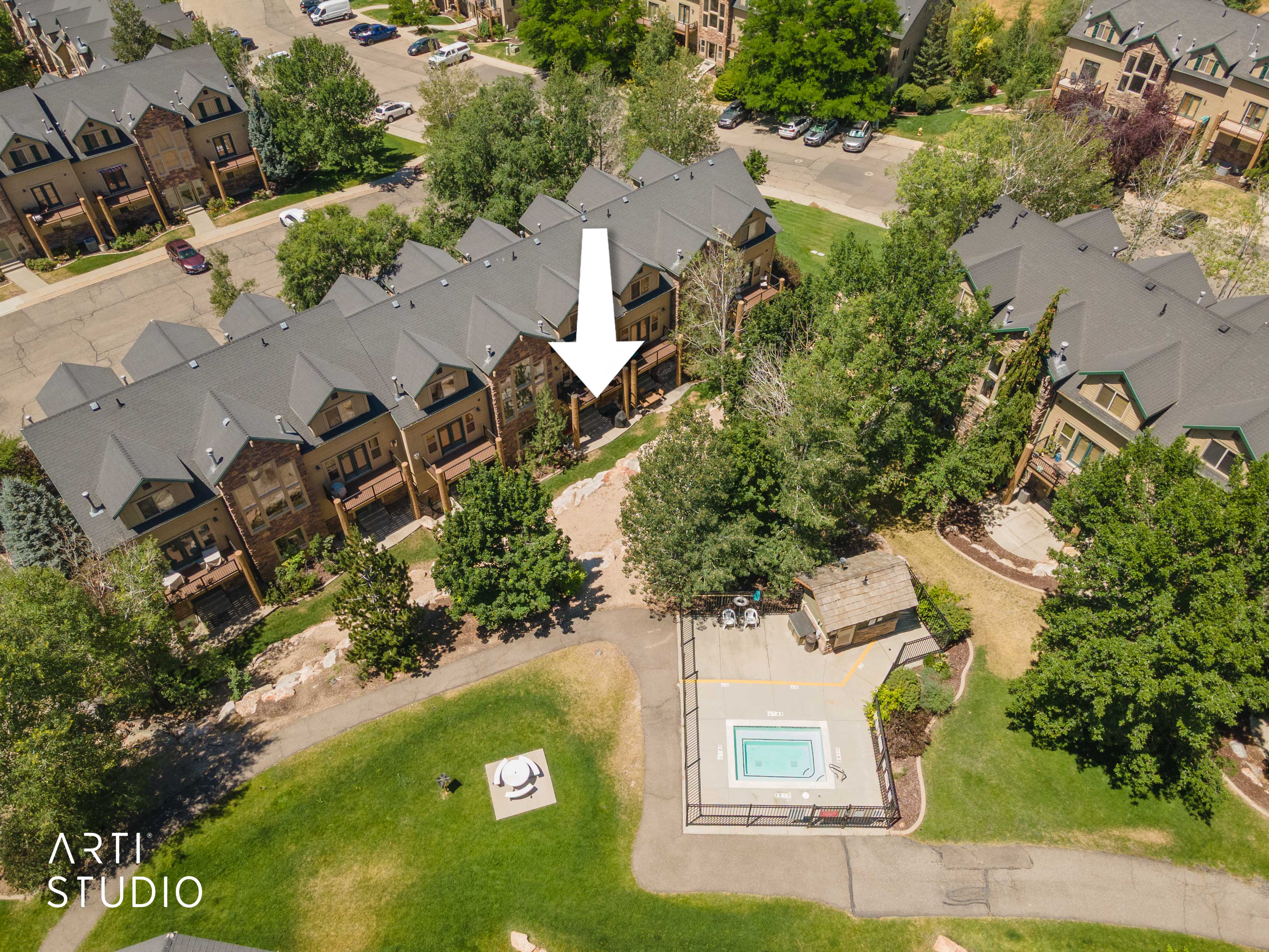 Unit 1107 with view of secluded community hot tub steps away.