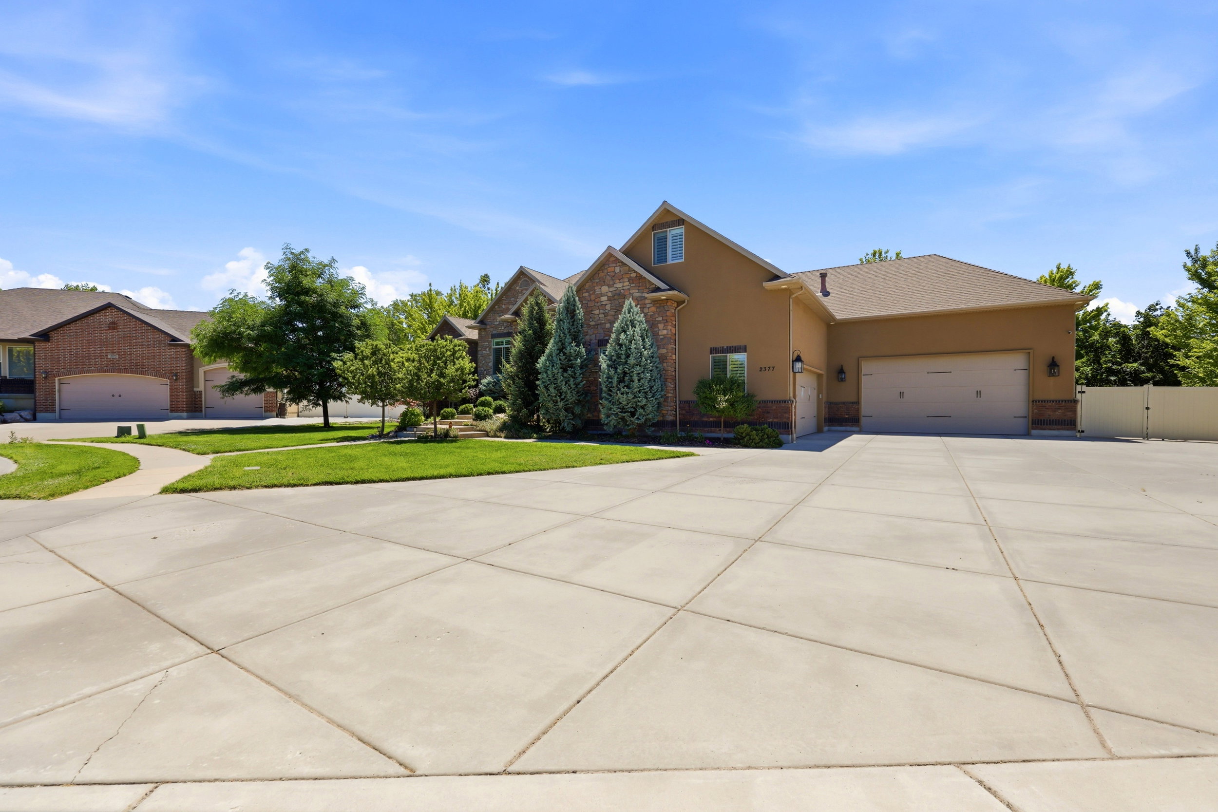 Expansive concrete driveway and parking area