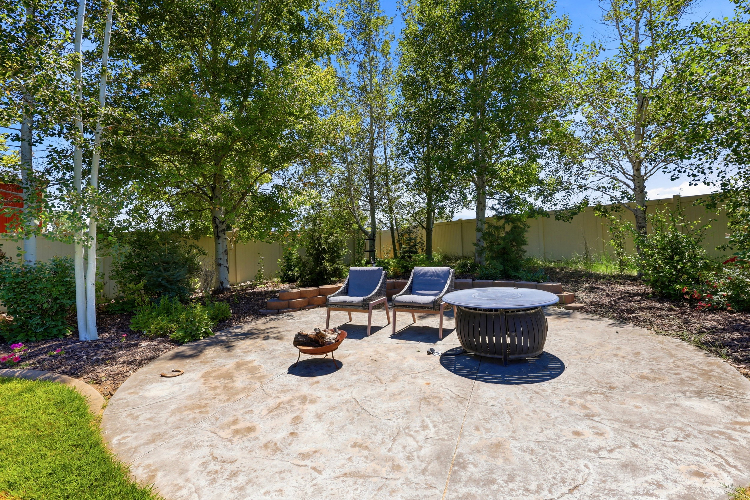 Stamped concrete patio with a circular design