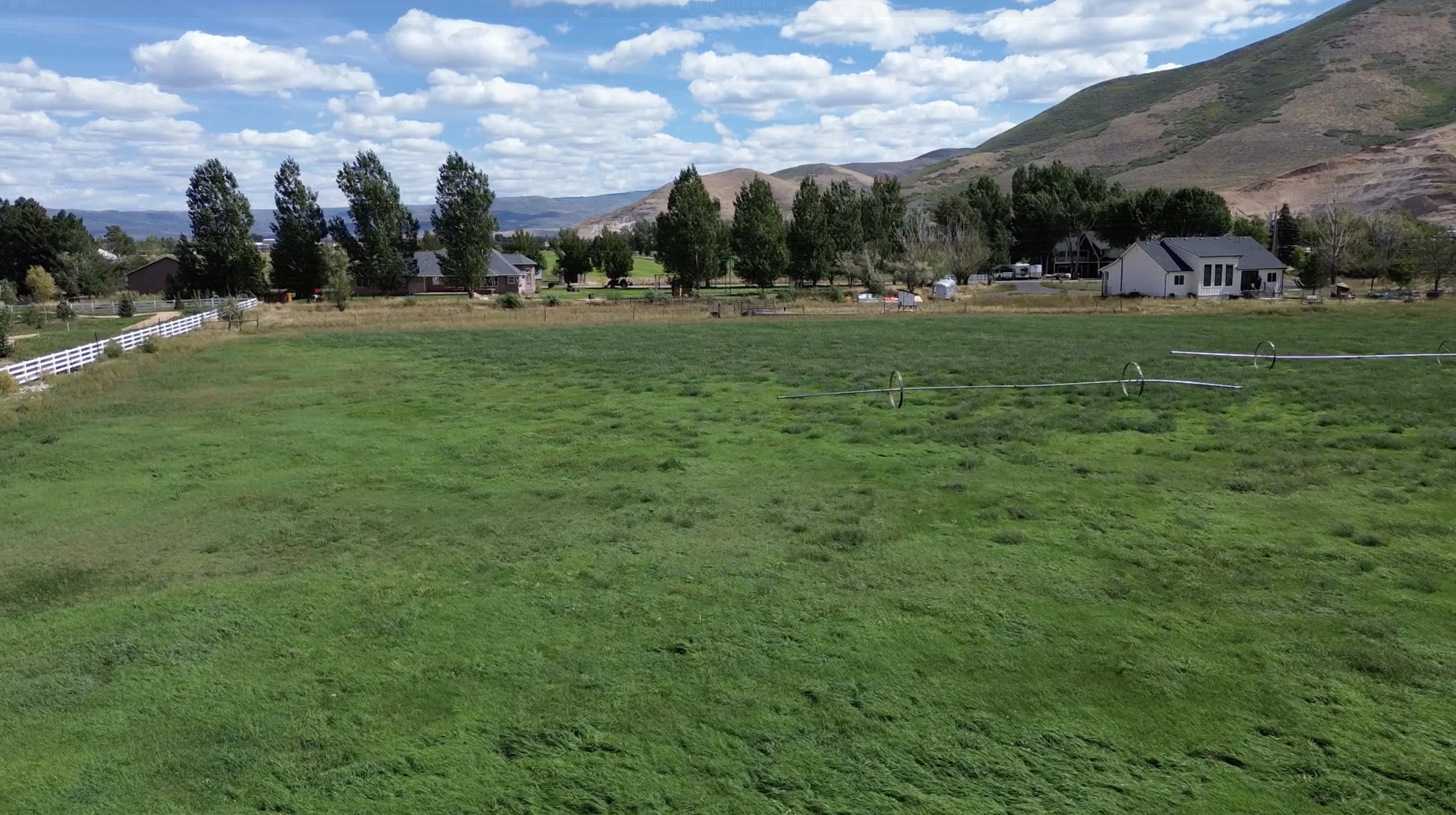 Expansive green field with irrigation system