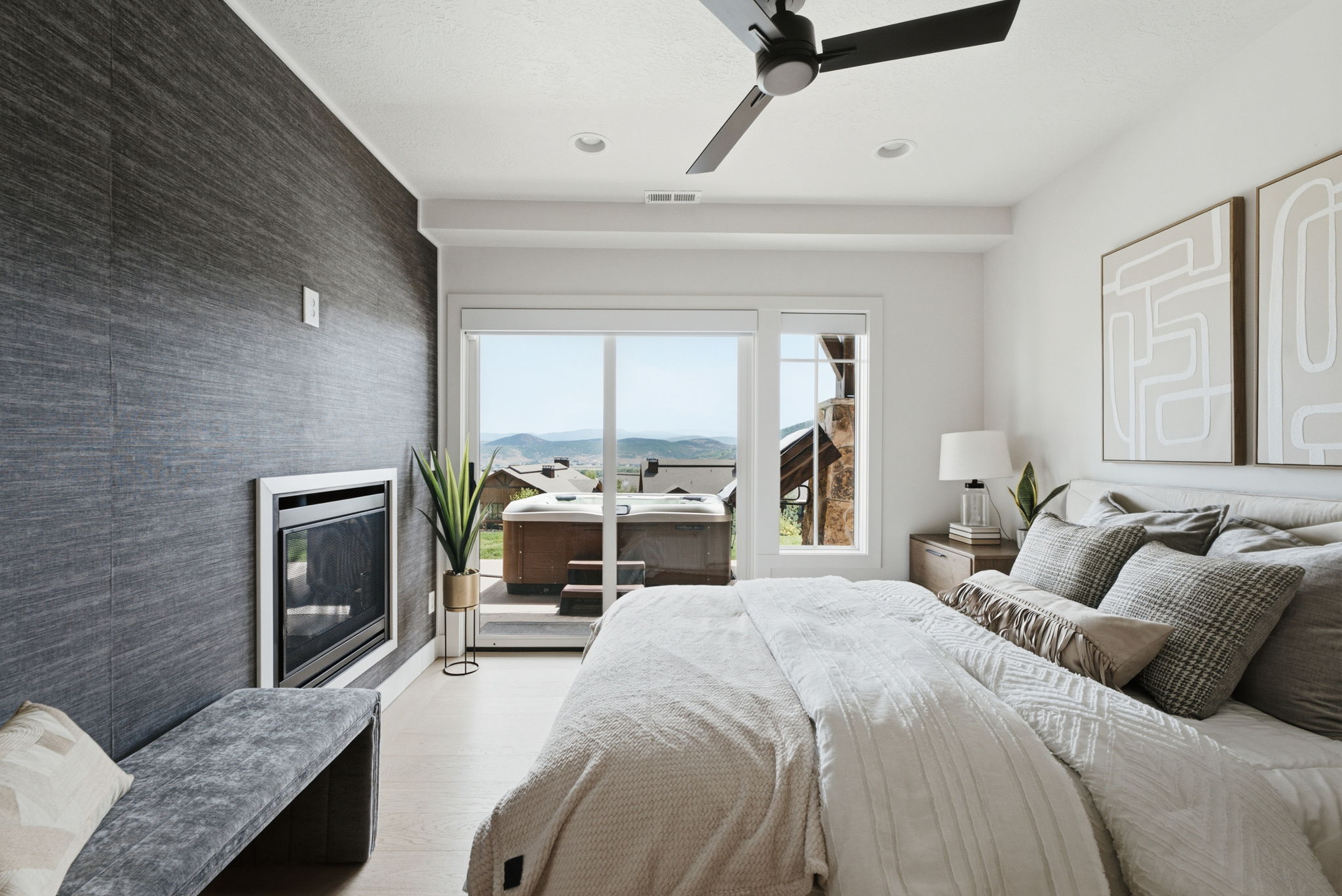 Jr Suite Bedroom featuring a built-in fireplace, sliding glass door, and recessed lighting