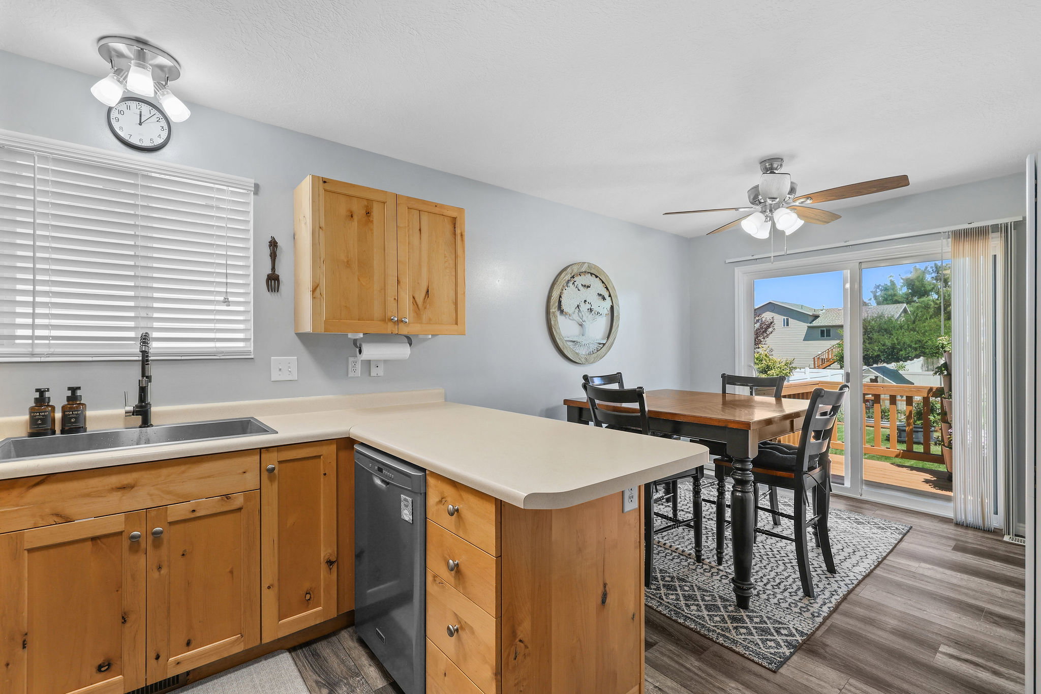 Kitchen area featuring wood-finish cabinetry