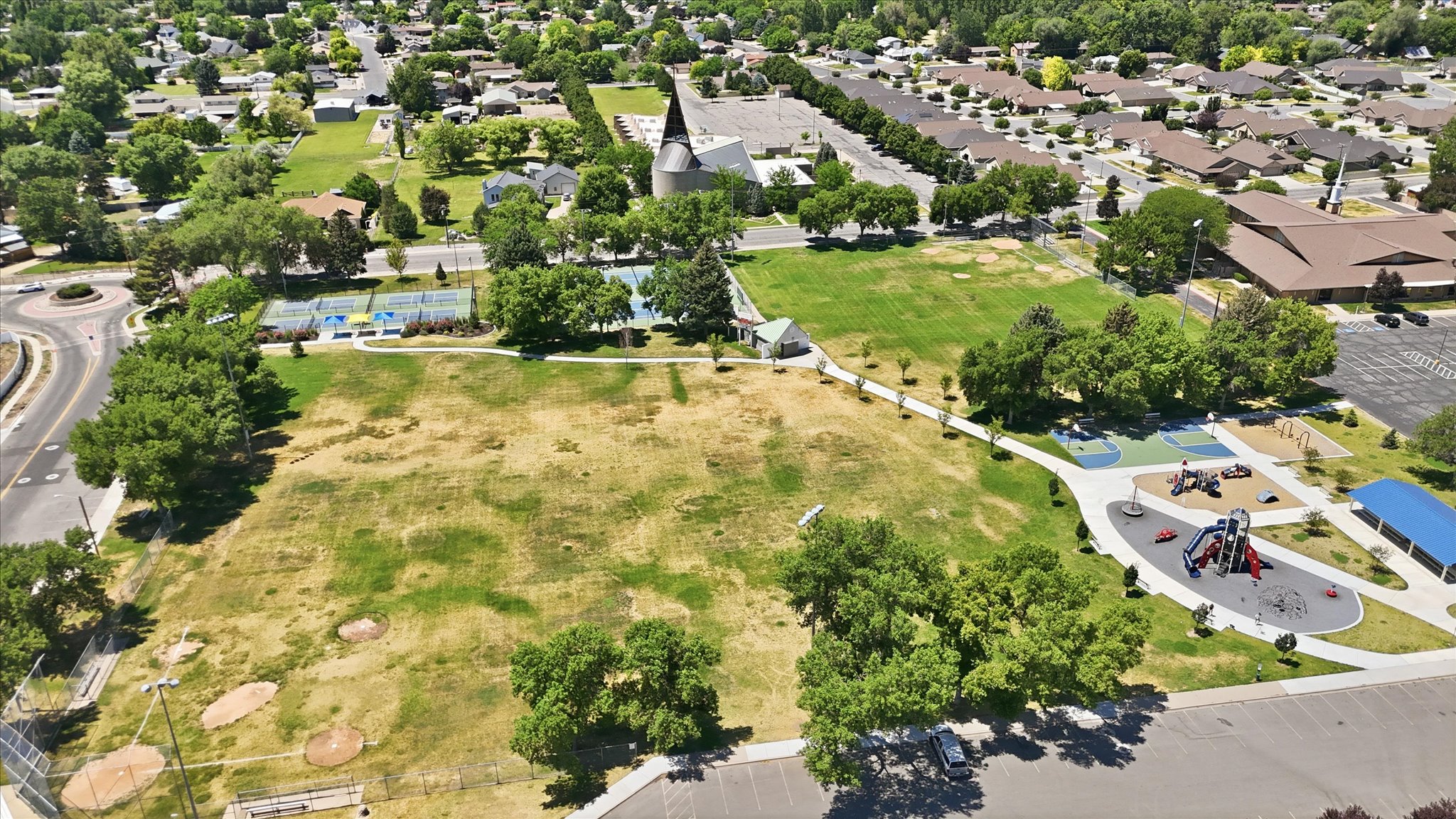 Expansive green space featuring recreational facilities
