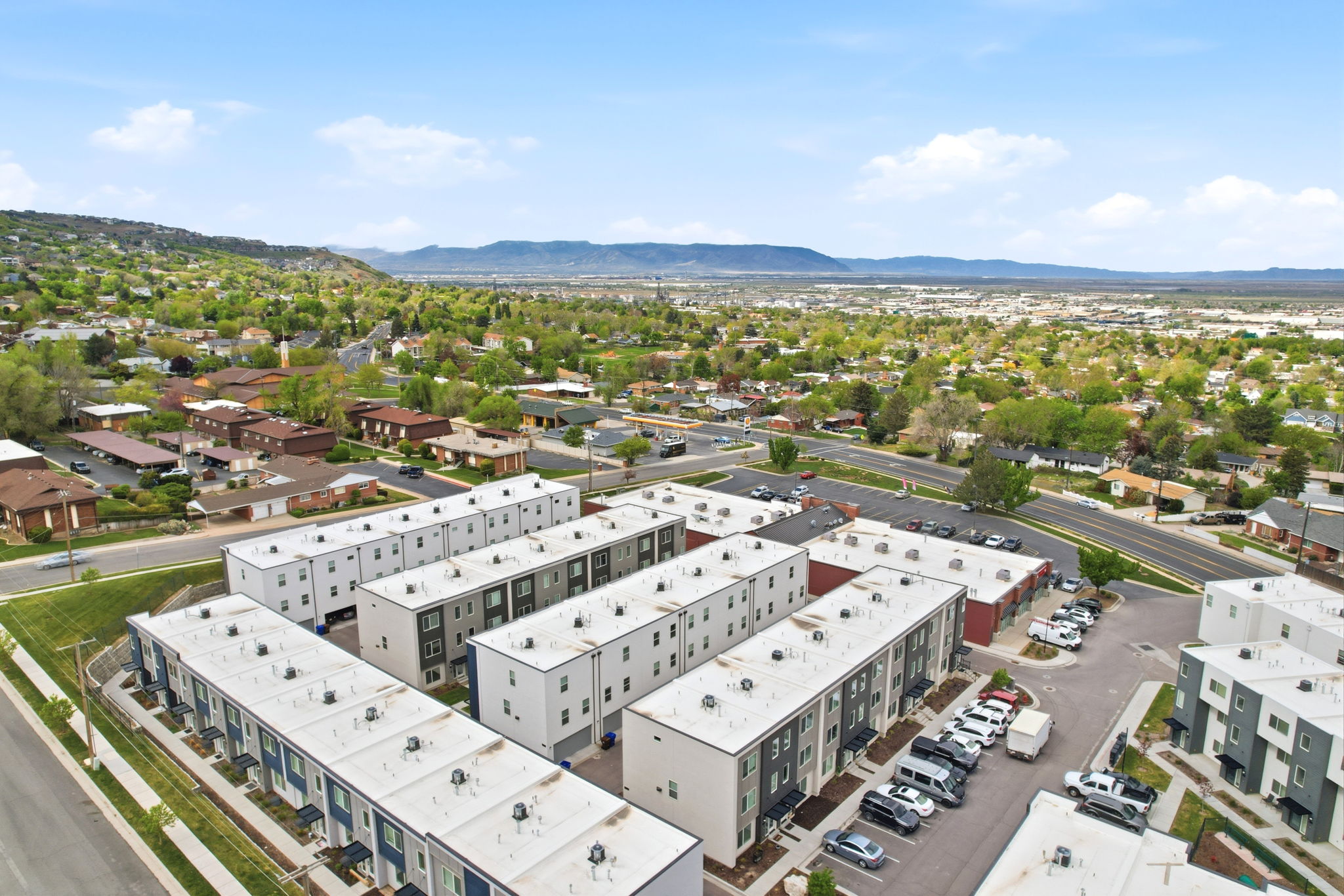 Modern townhome community featuring multi-story units with contemporary facades