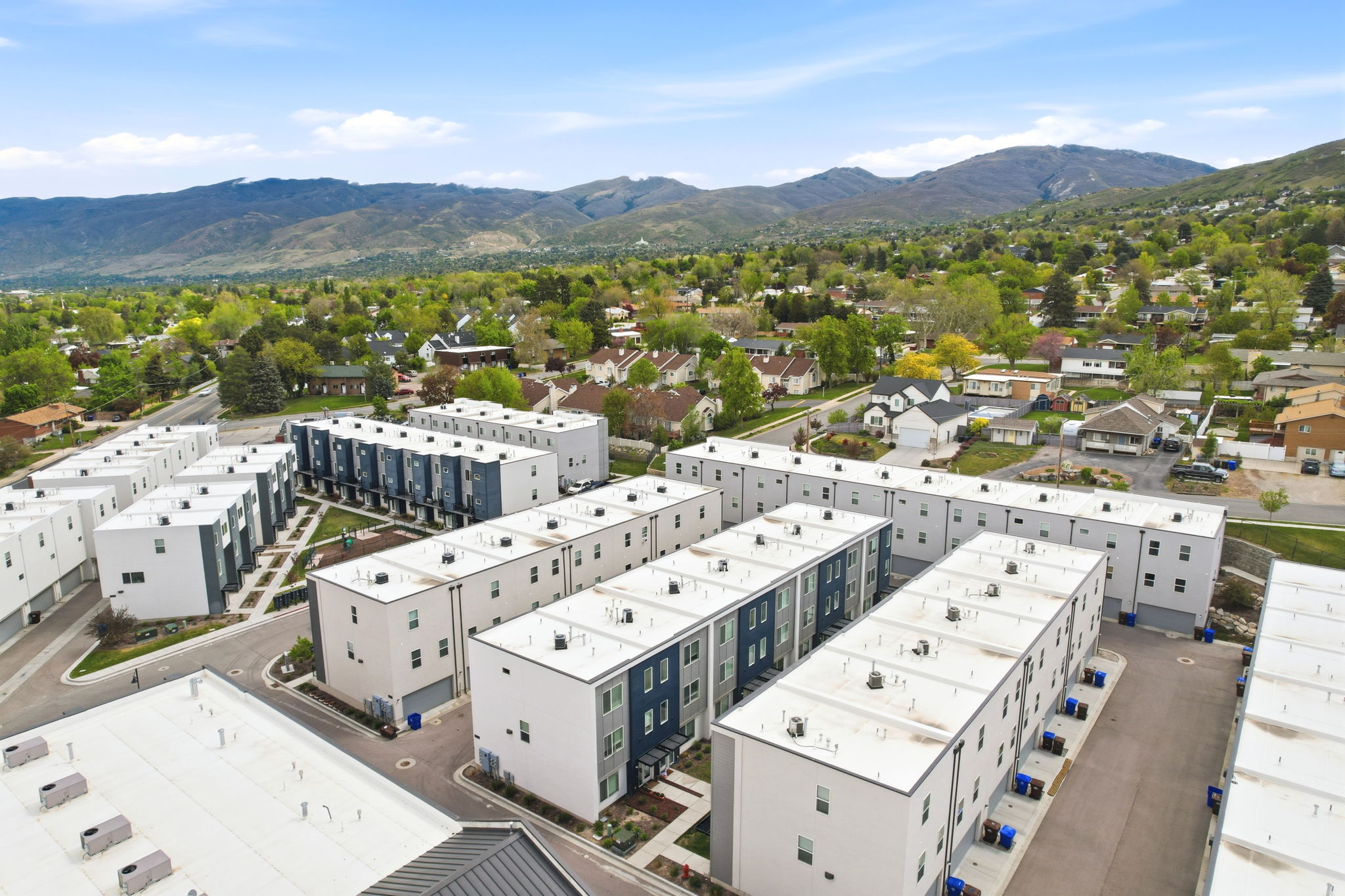 Modern townhome development featuring multiple rows of contemporary residences