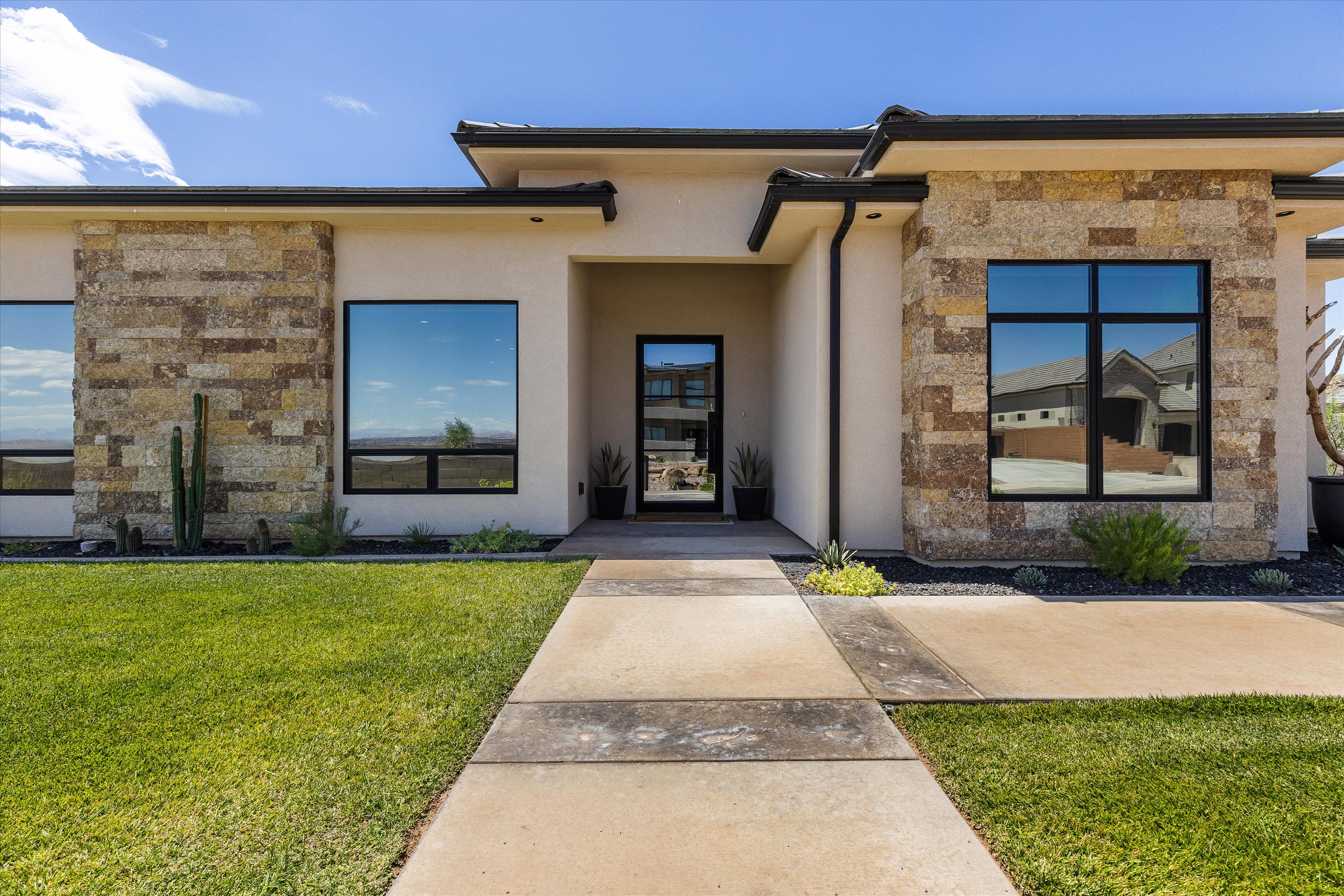 Tinted Doors and Windows in Welcoming Entry