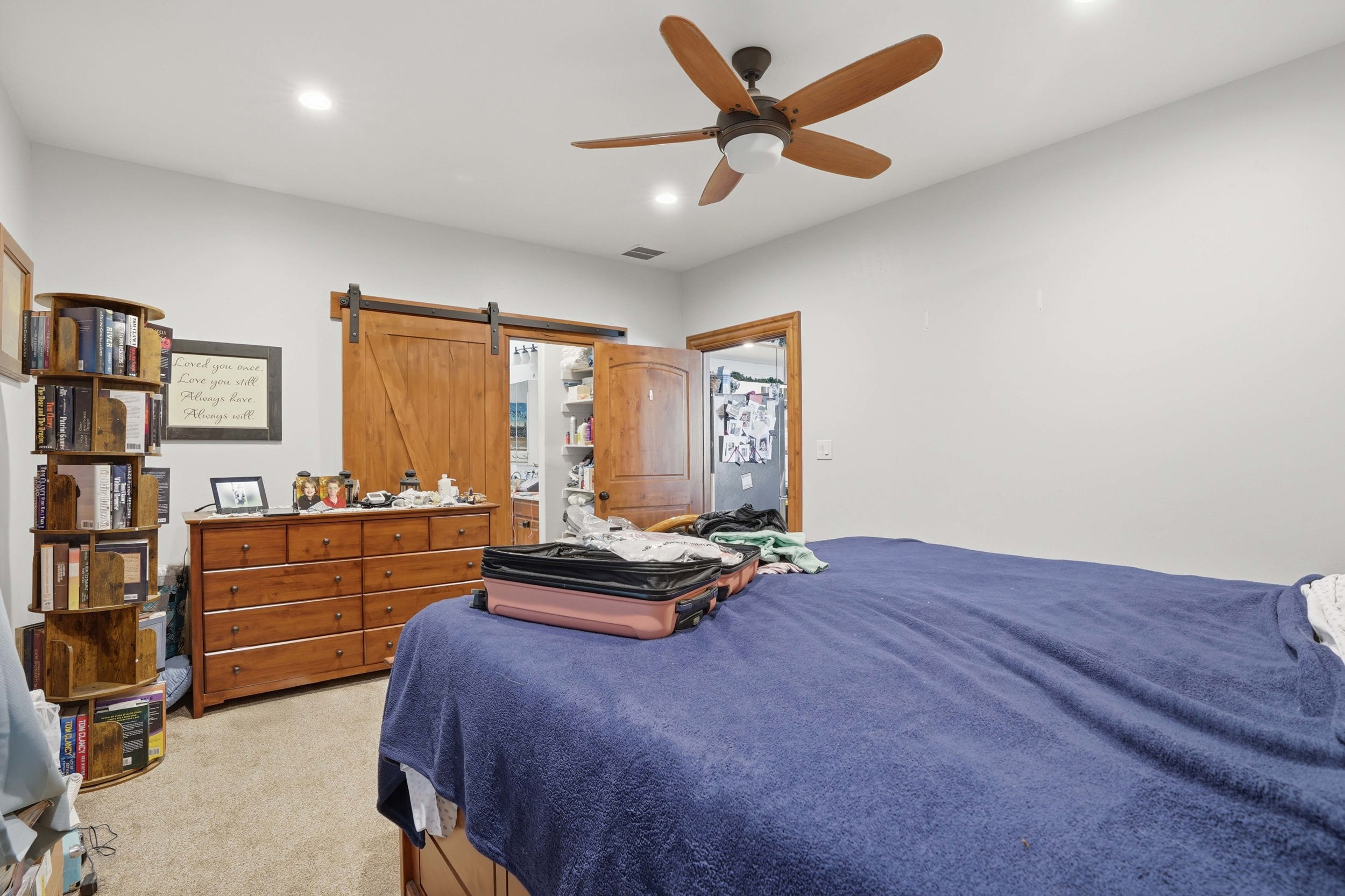 Interior room featuring light-colored walls and carpet flooring