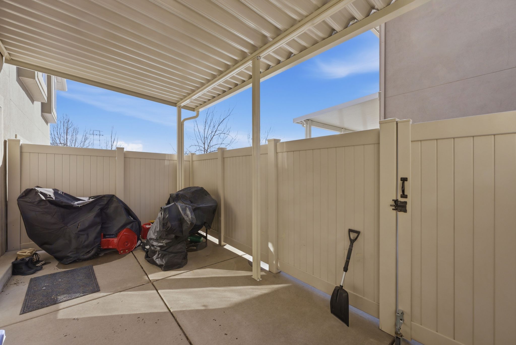 Enjoy your backyard with shade and cover. View of patio with grilling area