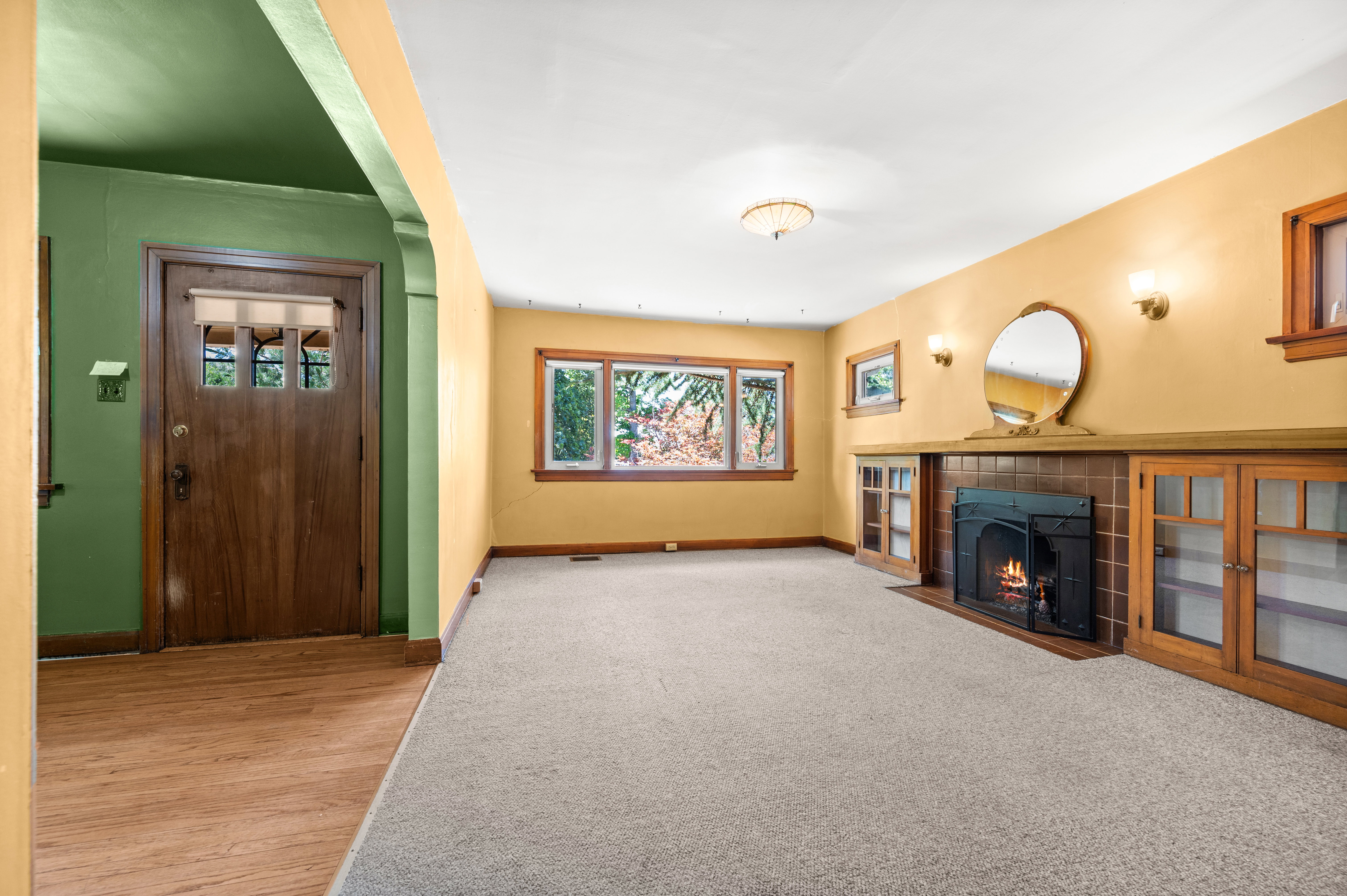 Original fireplace and woodwork.