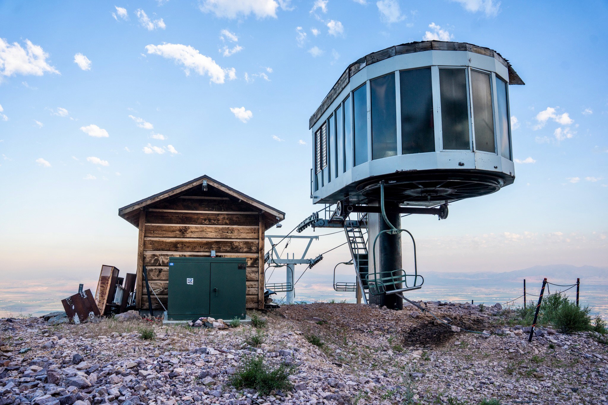 Elevated ski lift structure featuring a glass-enclosed operator booth