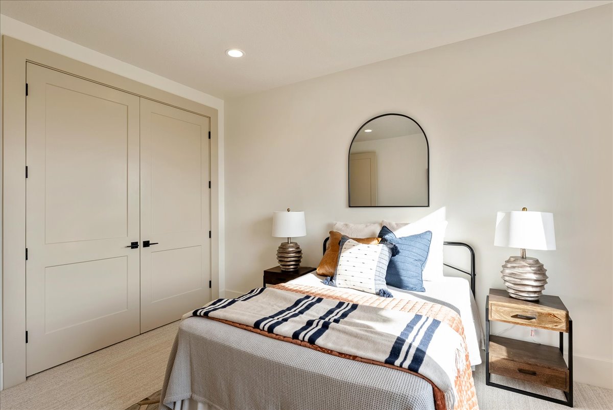 Recessed lighting illuminates neutral-toned walls