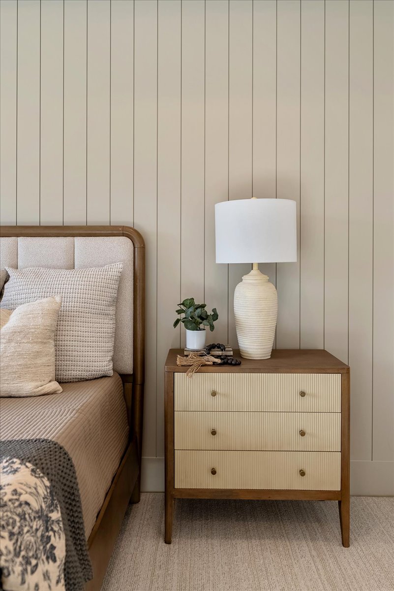 Vertical plank wall paneling provides architectural detail