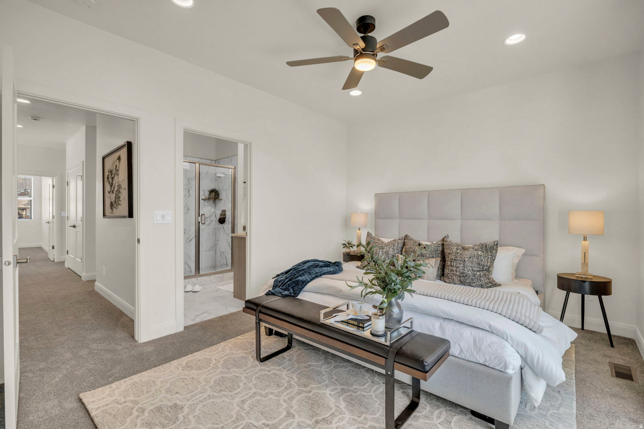 Spacious room with a ceiling fan, recessed lighting, and soft carpet flooring
