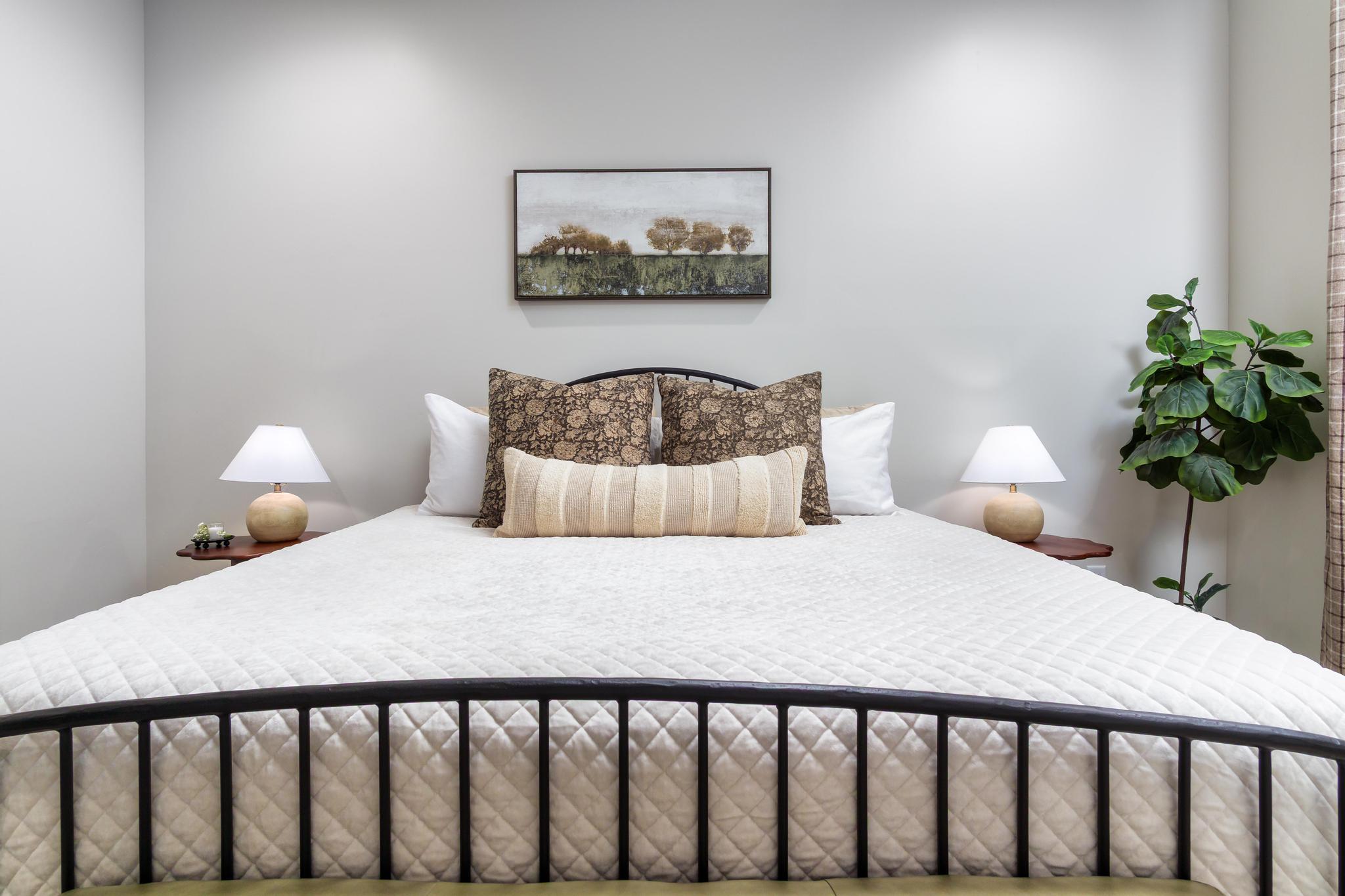 Recessed ceiling lighting illuminates a room with light-toned walls