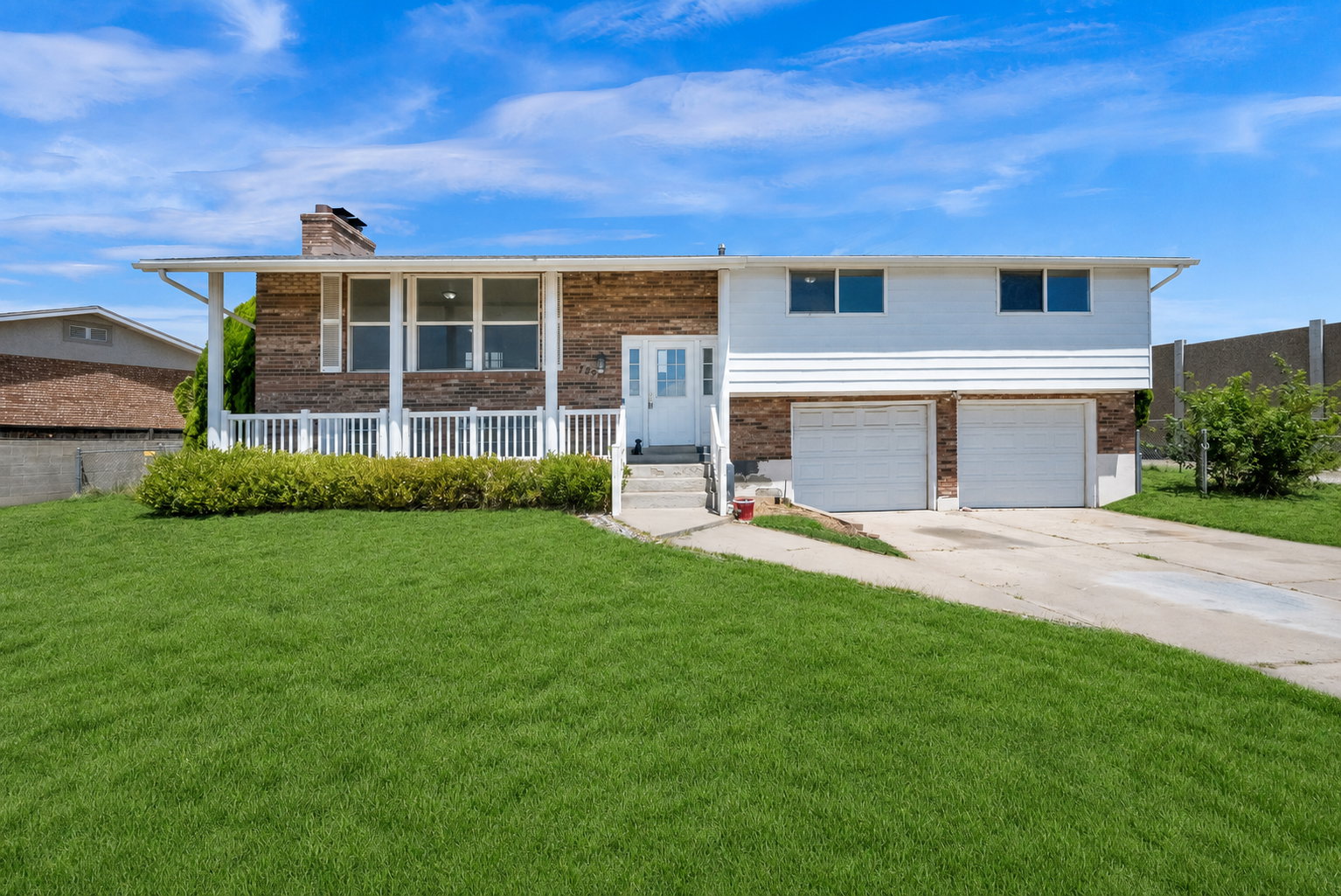 Front of Home with AI Green Grass