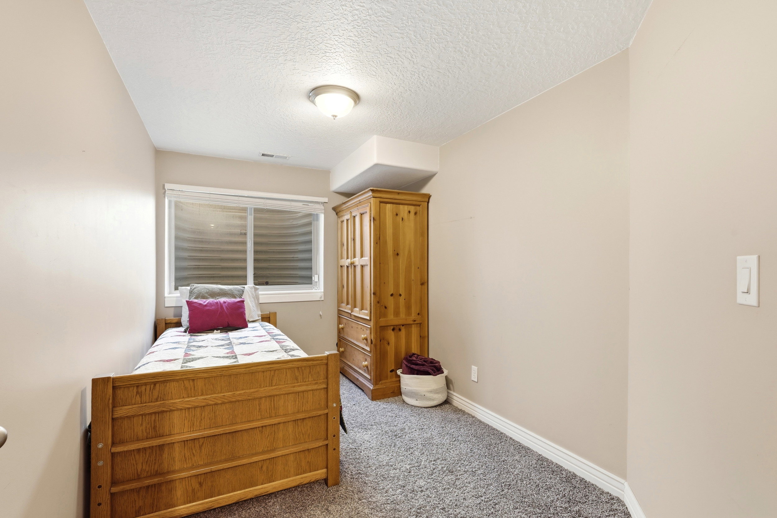 Recessed window with white blinds