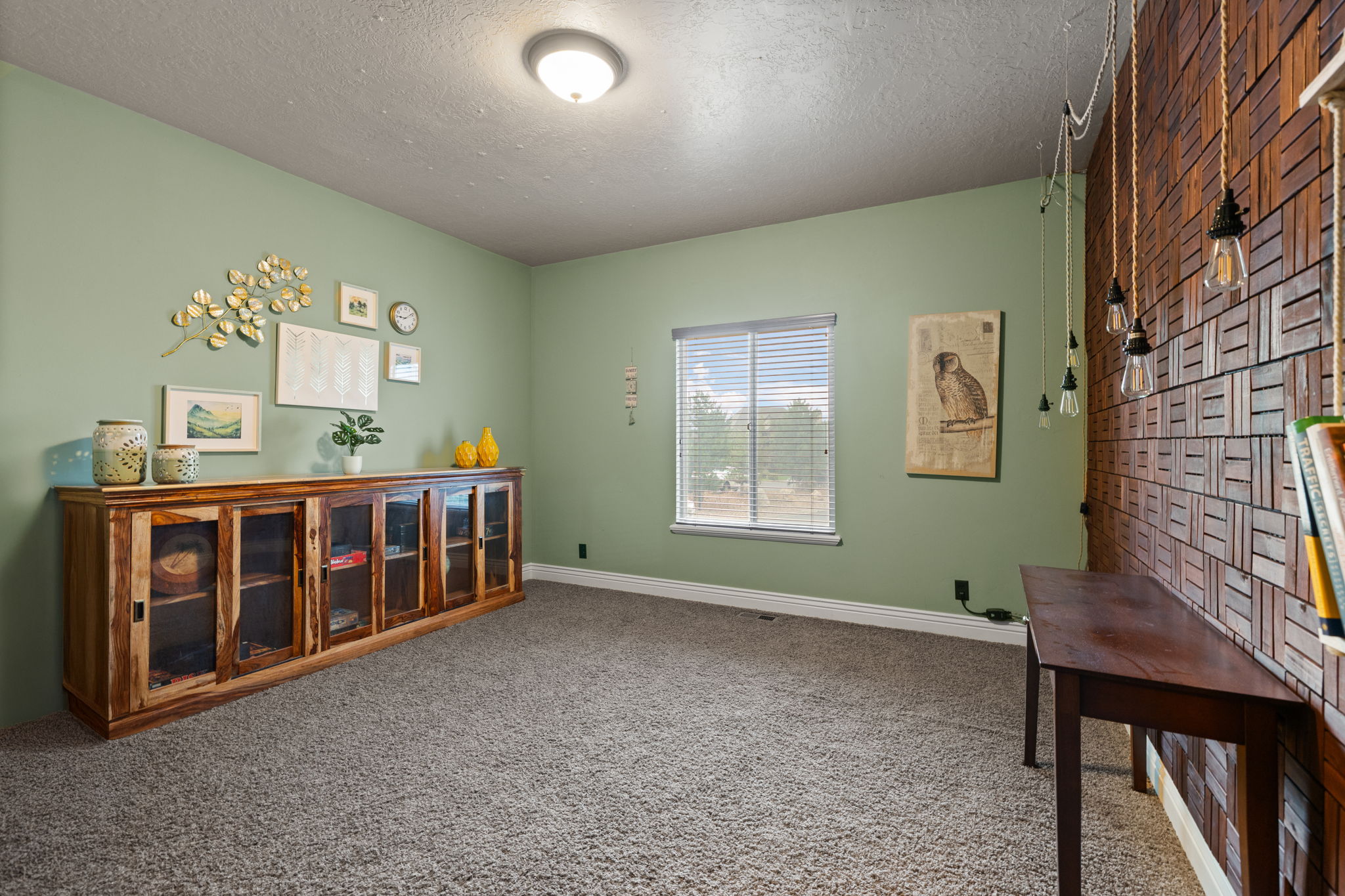Textured accent wall featuring a unique wood block pattern