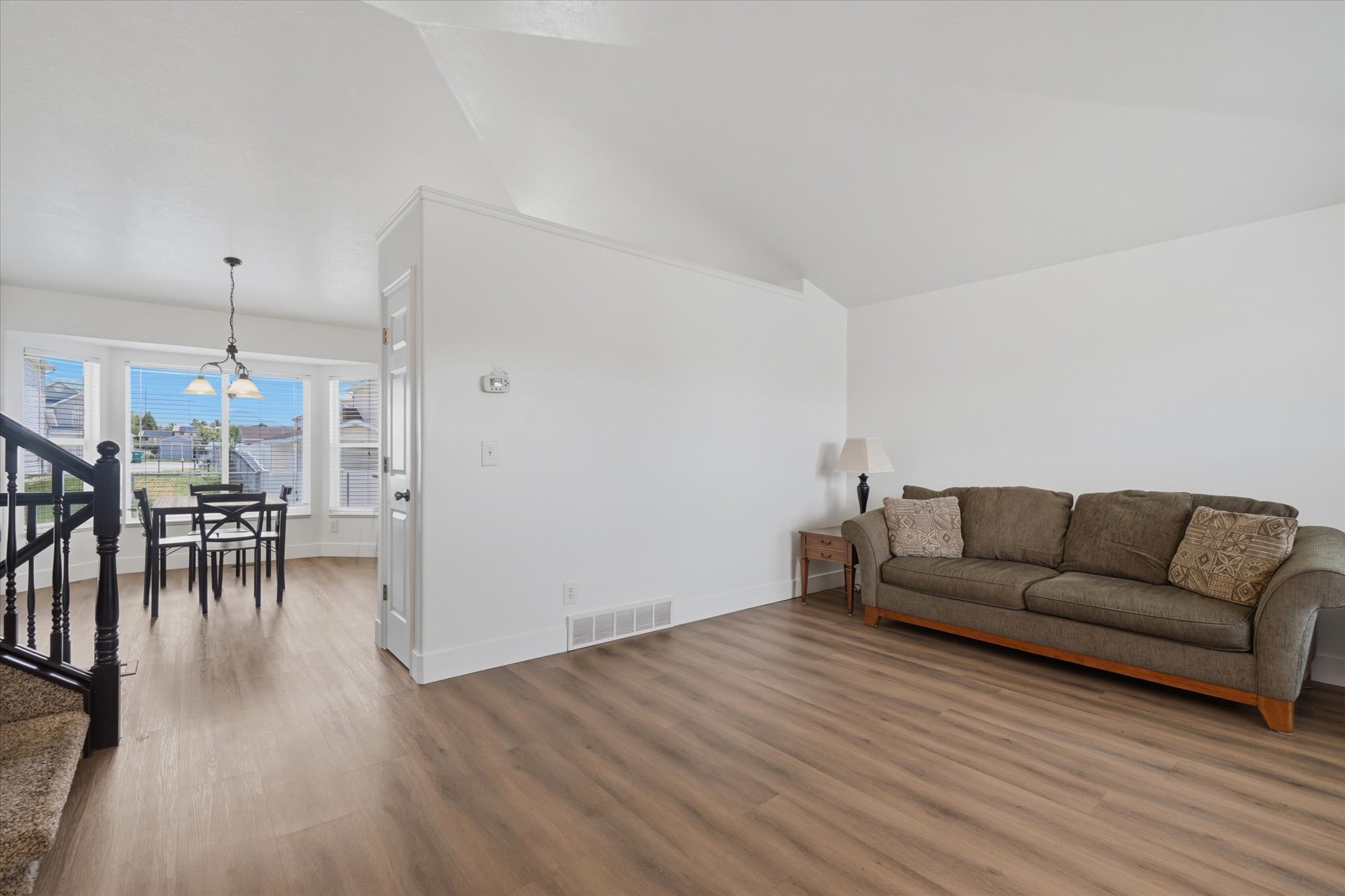 Living room, LVP flooring, vaulted ceiling