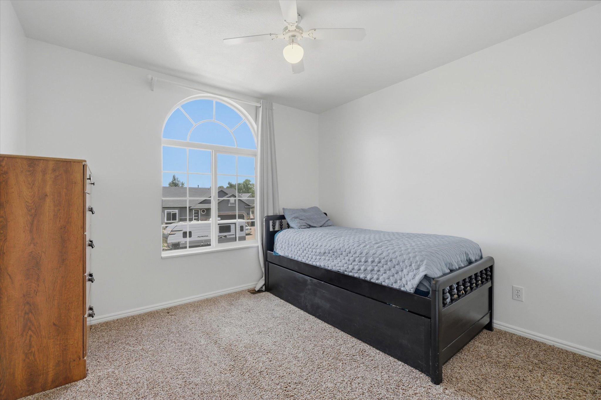 Bedroom with arched window