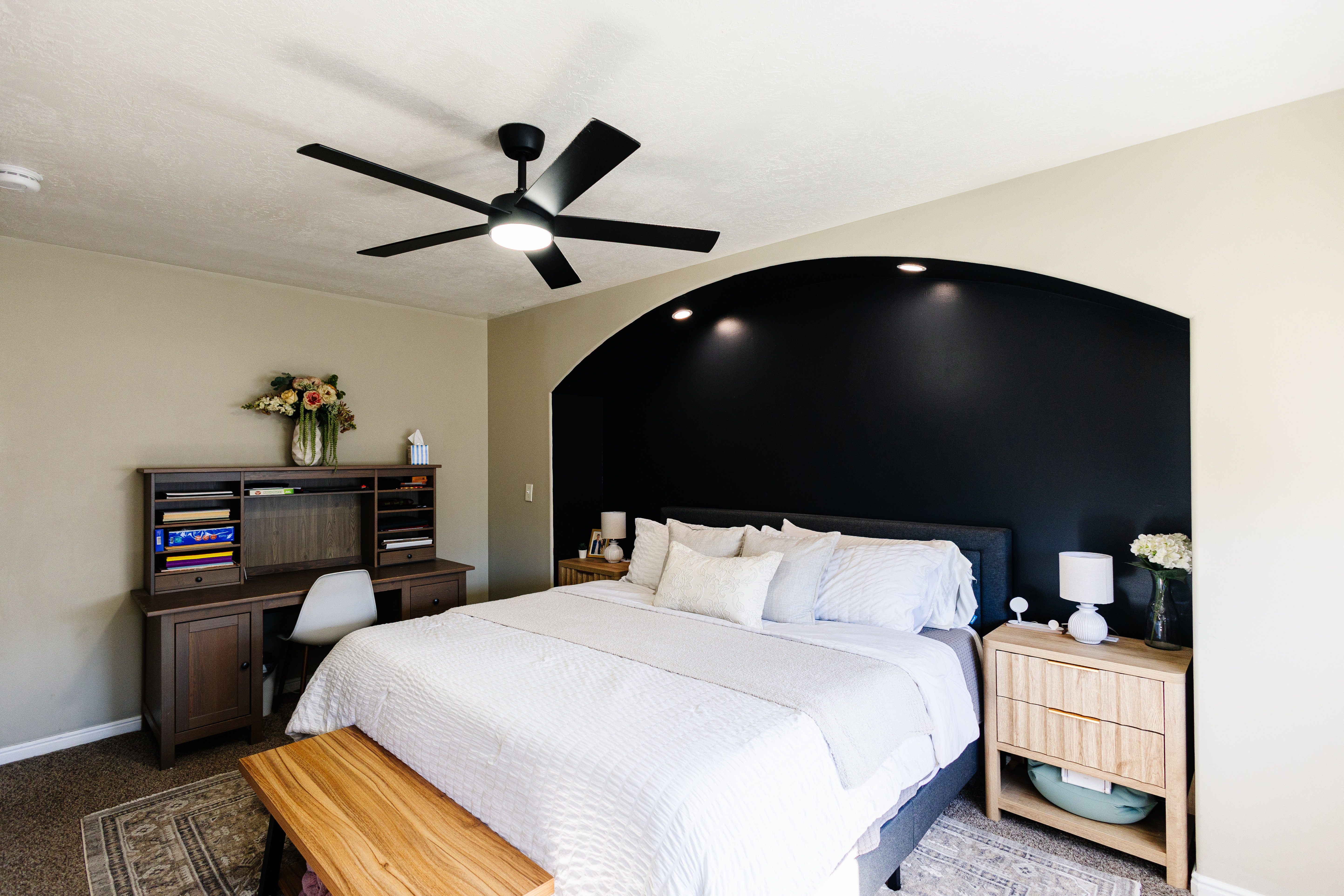 Recessed arched alcove with accent wall and task lighting