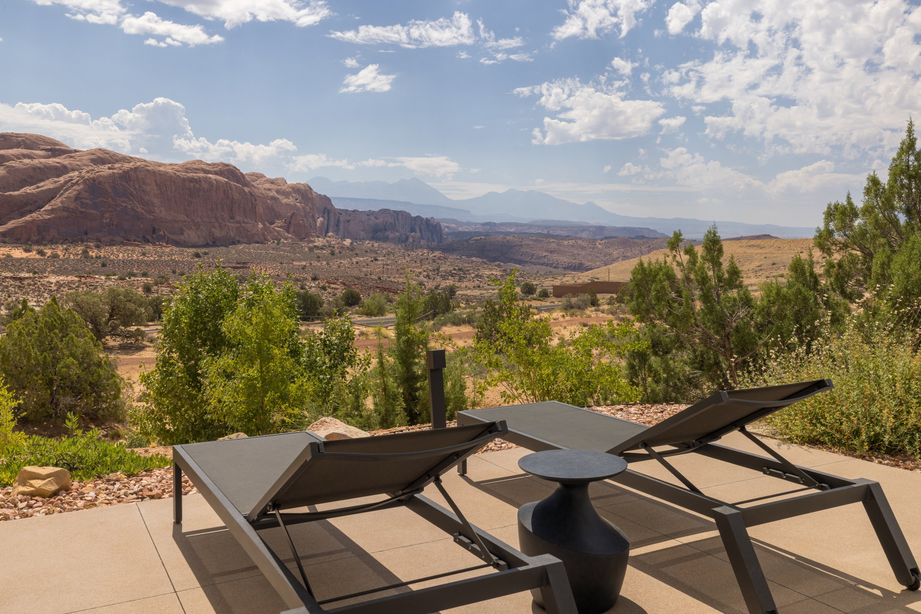Outdoor patio with a desert mountain backdrop