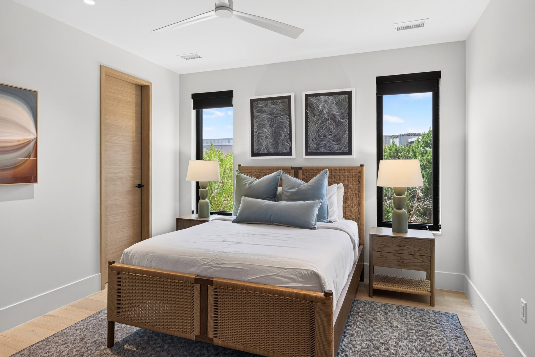 Room featuring wood-finish flooring, recessed lighting, and a ceiling fan