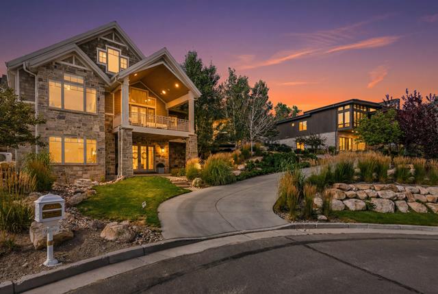 Stone and siding exterior with gabled roof lines
