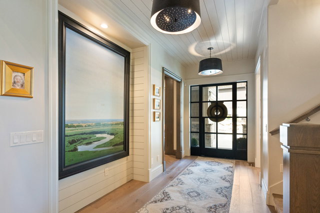 Entryway featuring a grid-paneled glass door with sidelights, wood-finish flooring, and shiplap ceiling