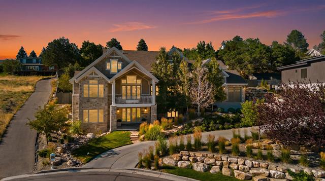 Stone and siding exterior with gabled roofline