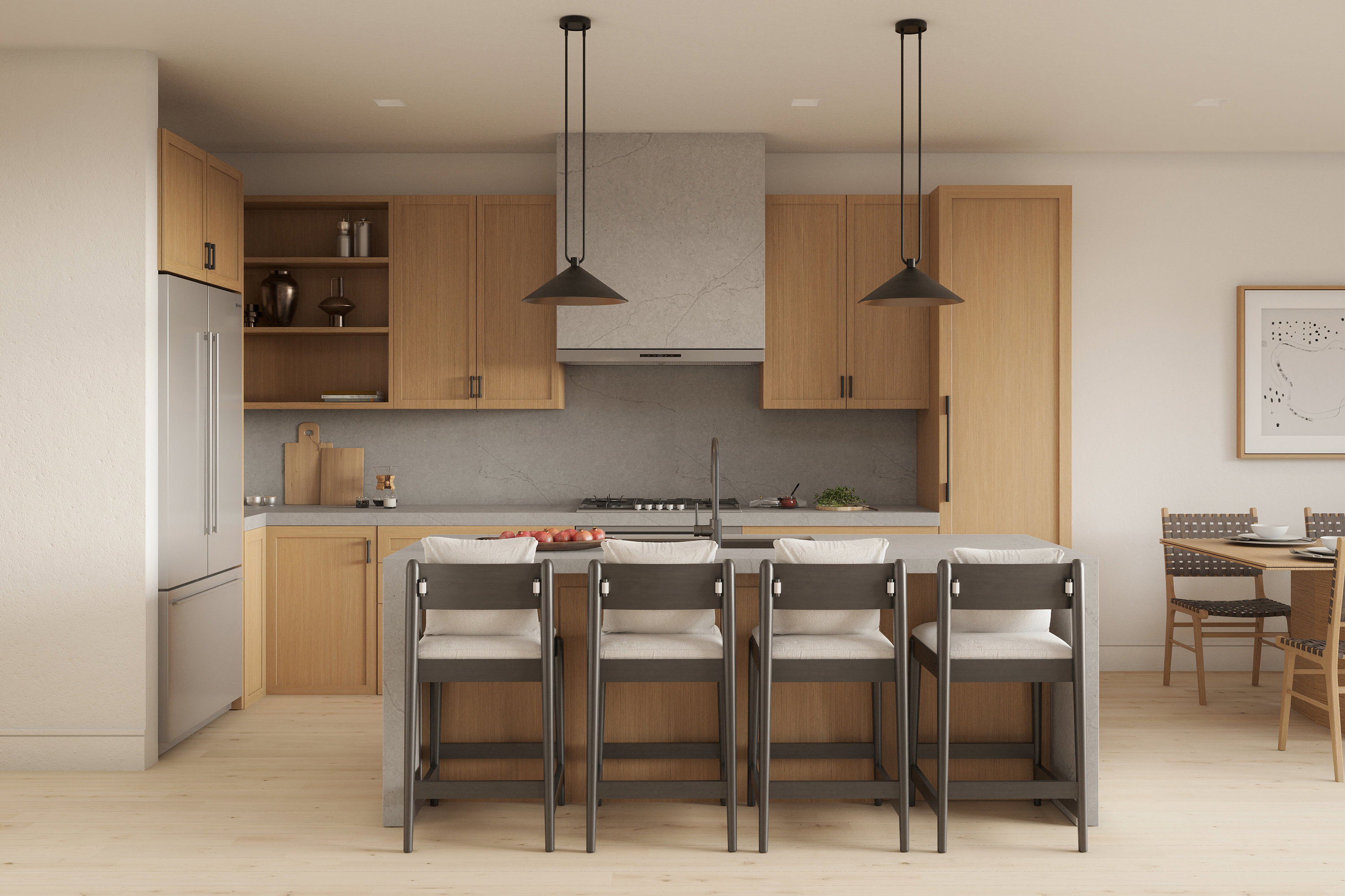 Open-concept kitchen featuring light wood cabinetry, stainless steel appliances, a center island with seating, and pendant lighting