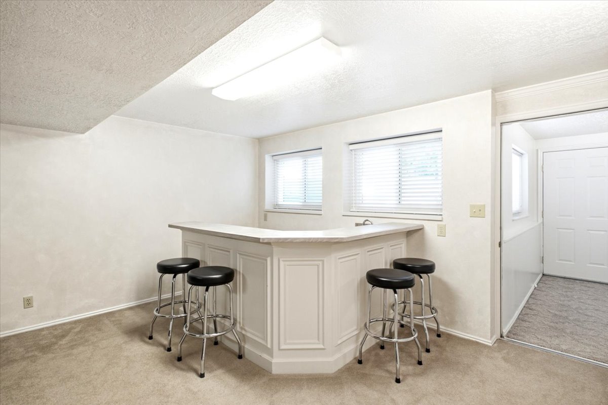 Built-in bar with with sink, microwave and mini fridge