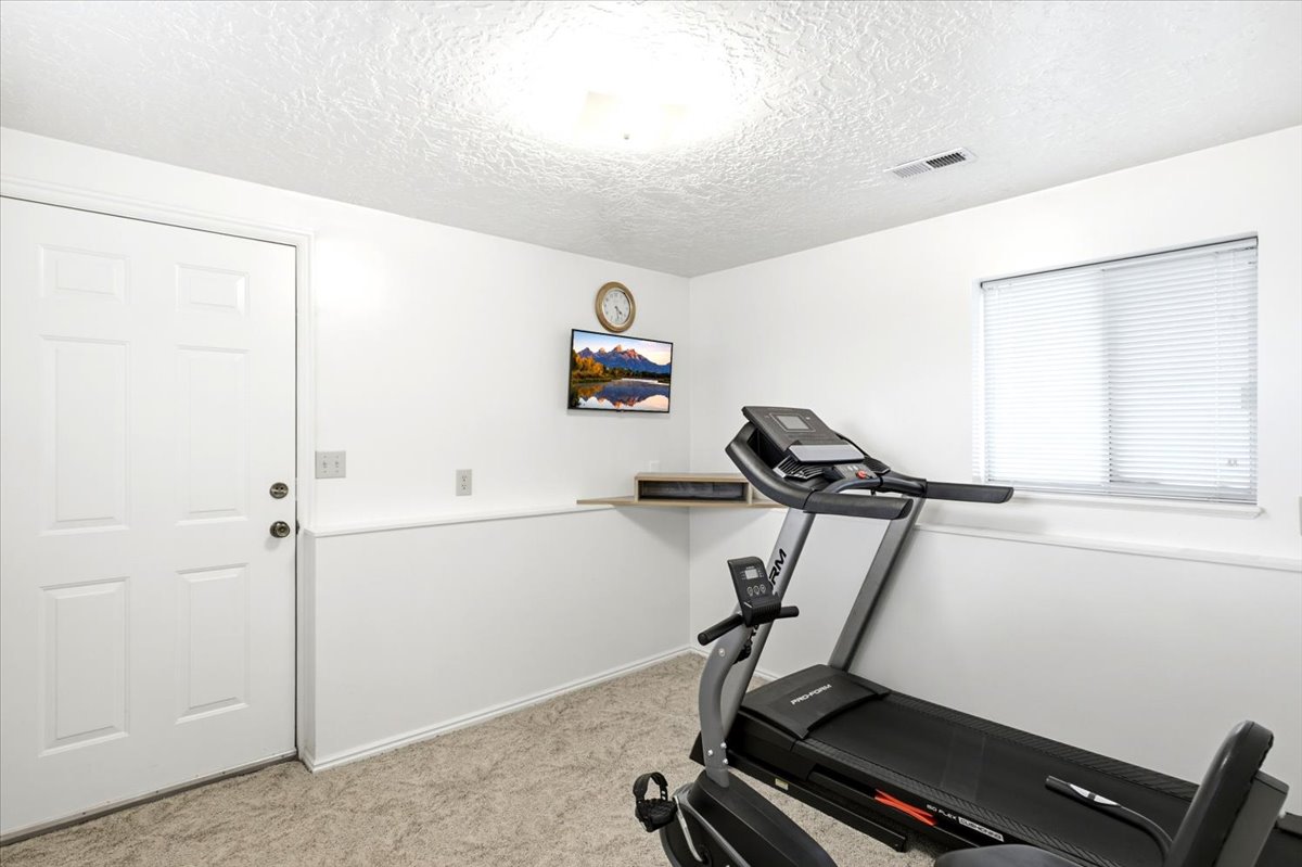 Flex space. Great space for exercise room with walkout access. Potential for ADU or Mother in Law