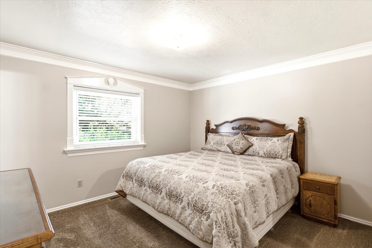 Primary bedroom with plenty of space for  king bed frame. Walk-in closet and en suite primary bathroom