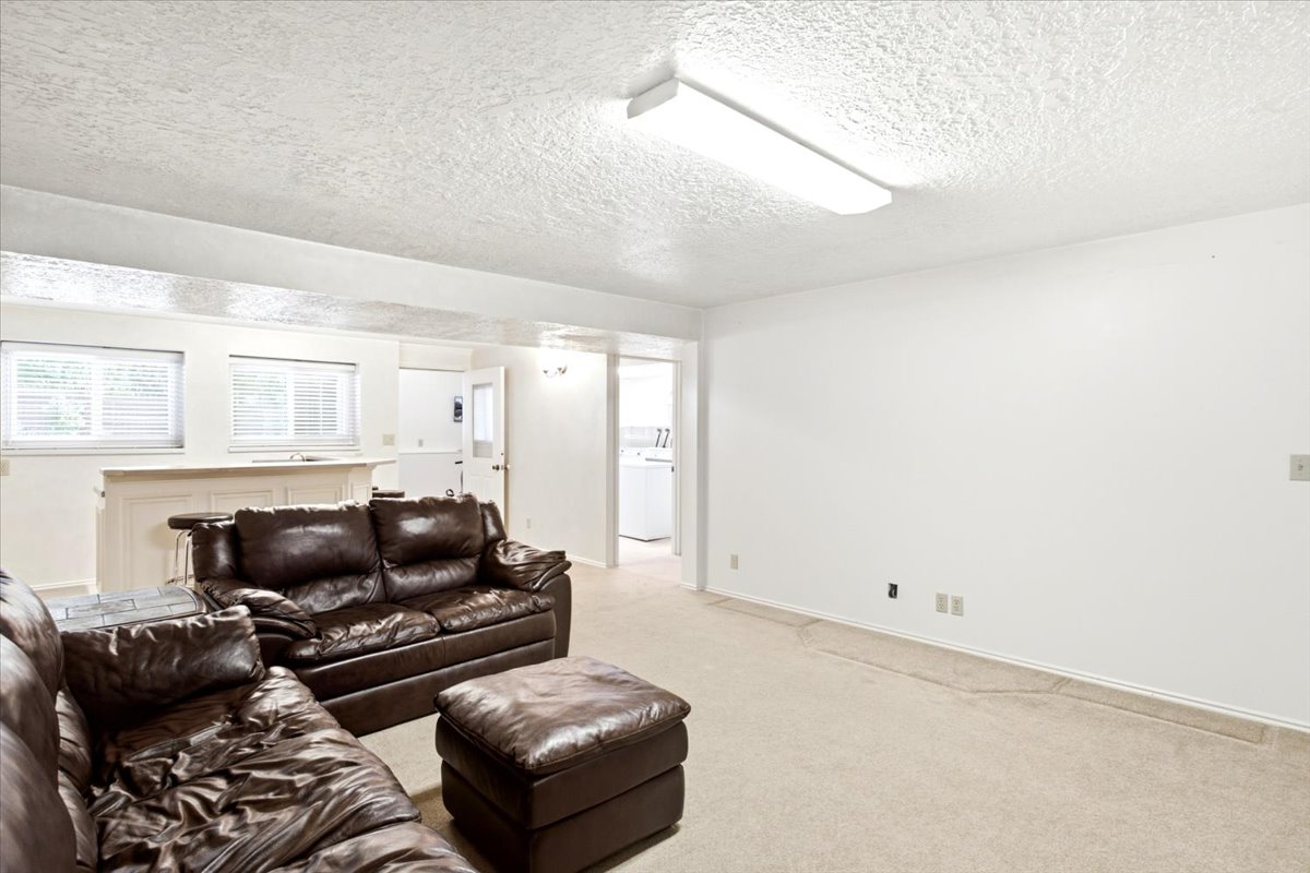 Family room with view of laundry and walkout area.