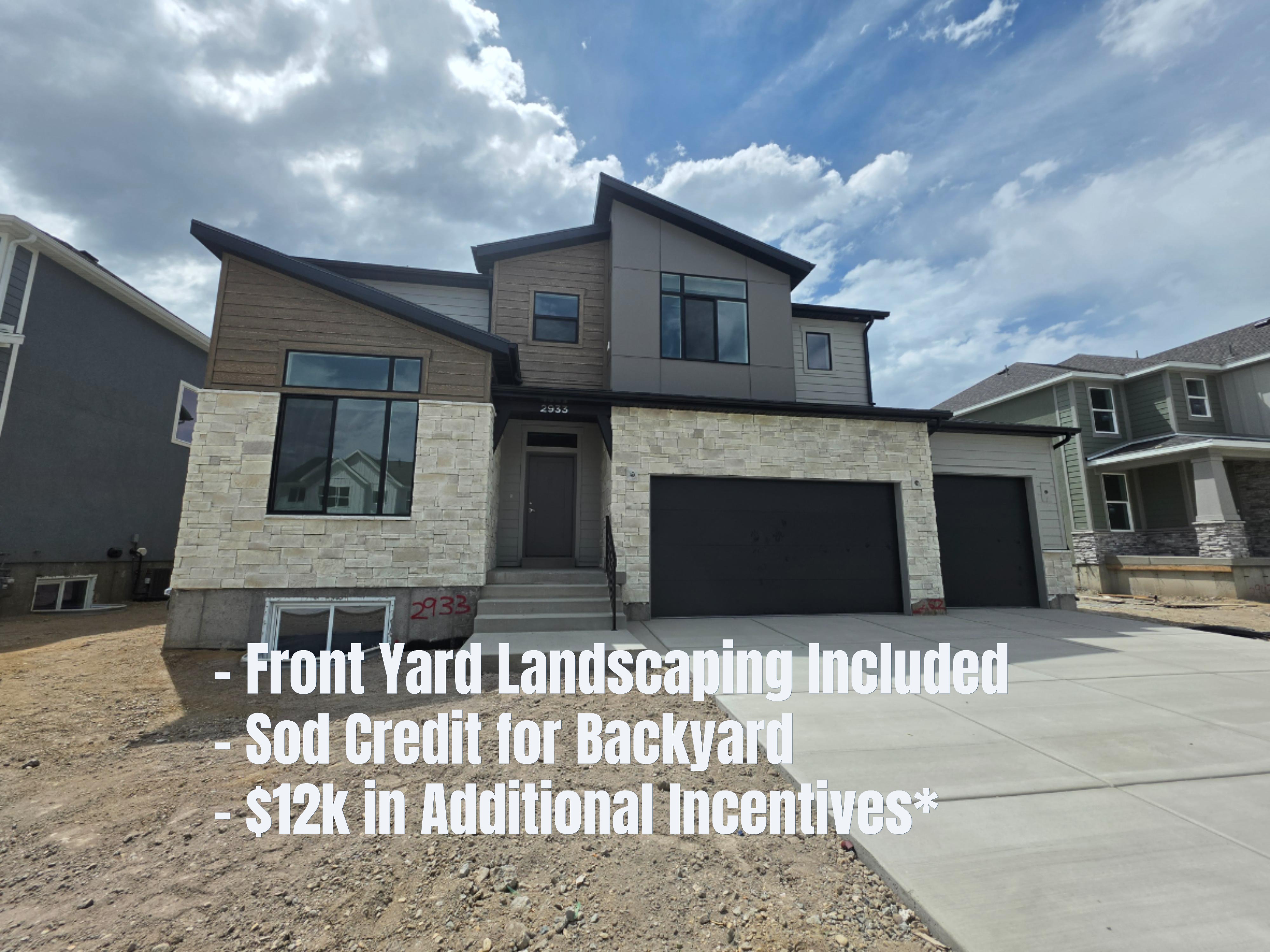 Contemporary architectural style featuring varied siding materials including light-toned stone veneer and horizontal wood-finish panels