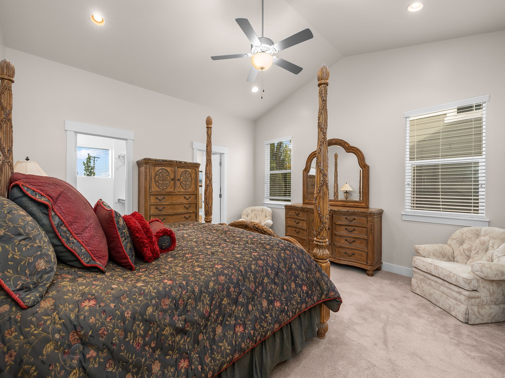 Spacious master bedroom with vaulted ceilings.