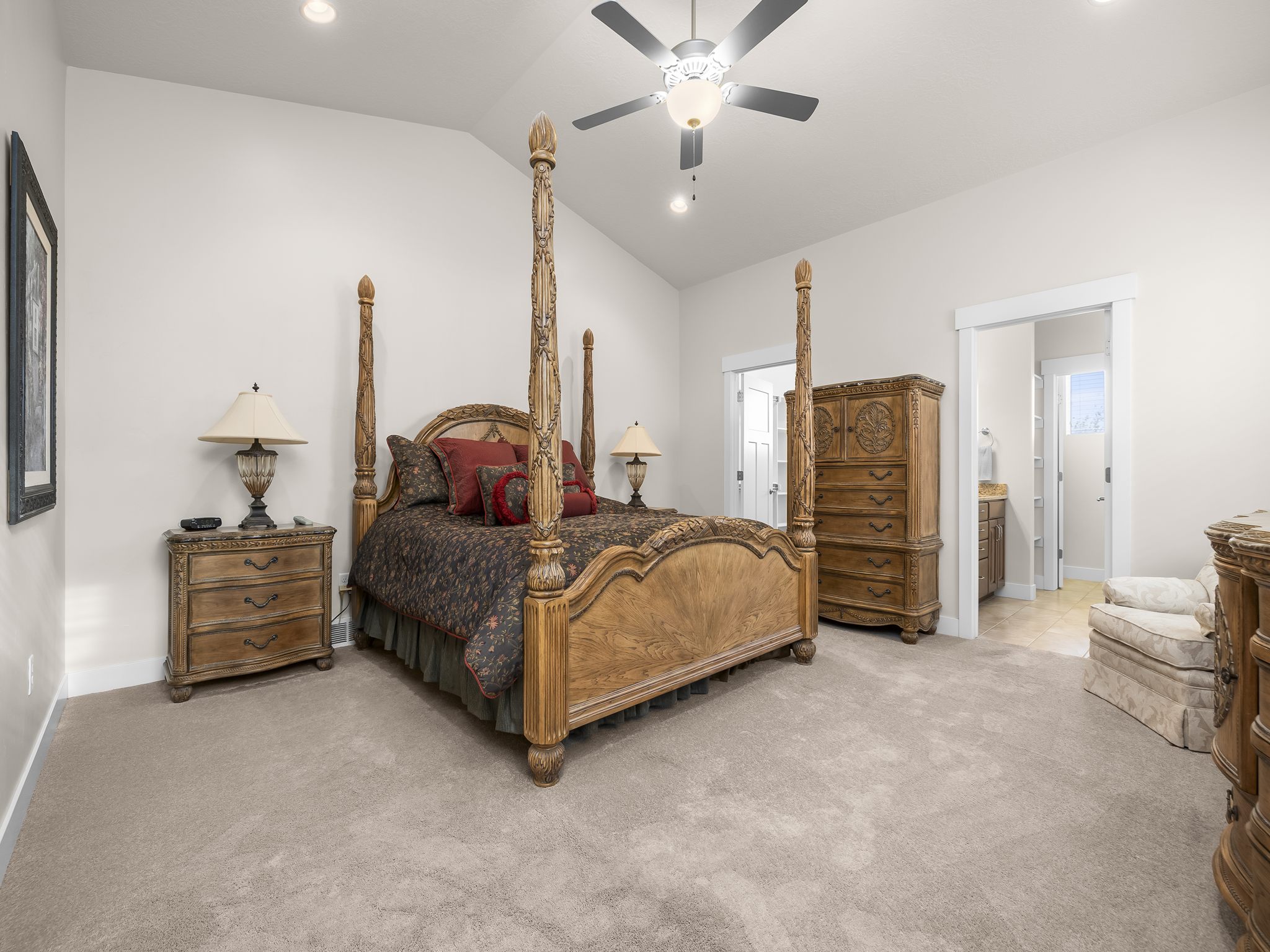 Spacious master bedroom with vaulted ceilings.