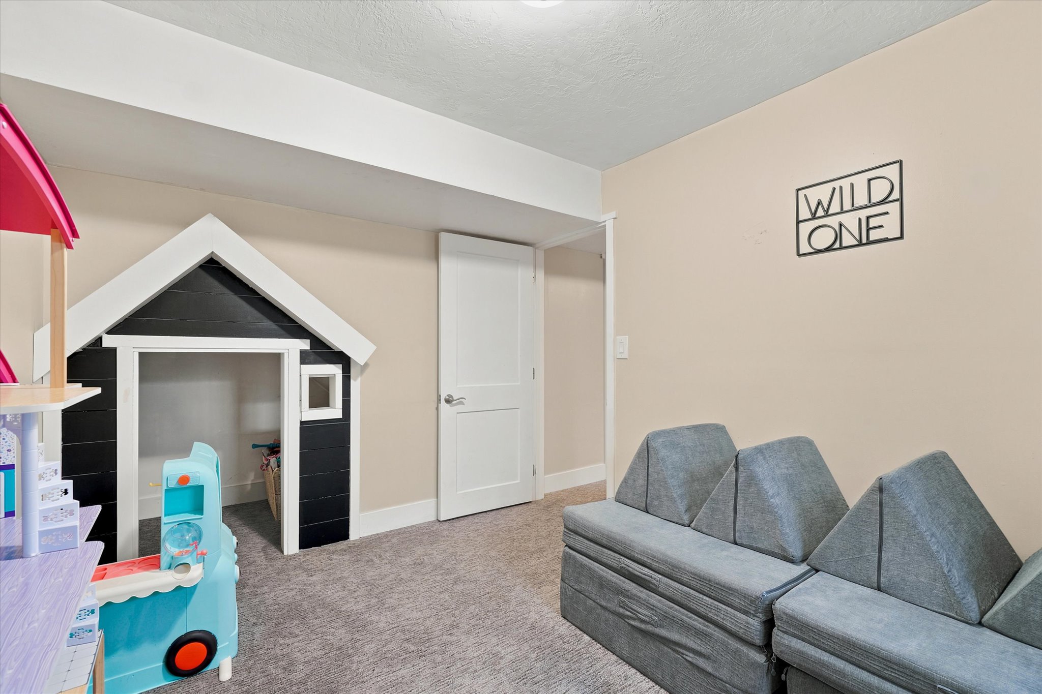 Dedicated room with recessed lighting and neutral wall tones