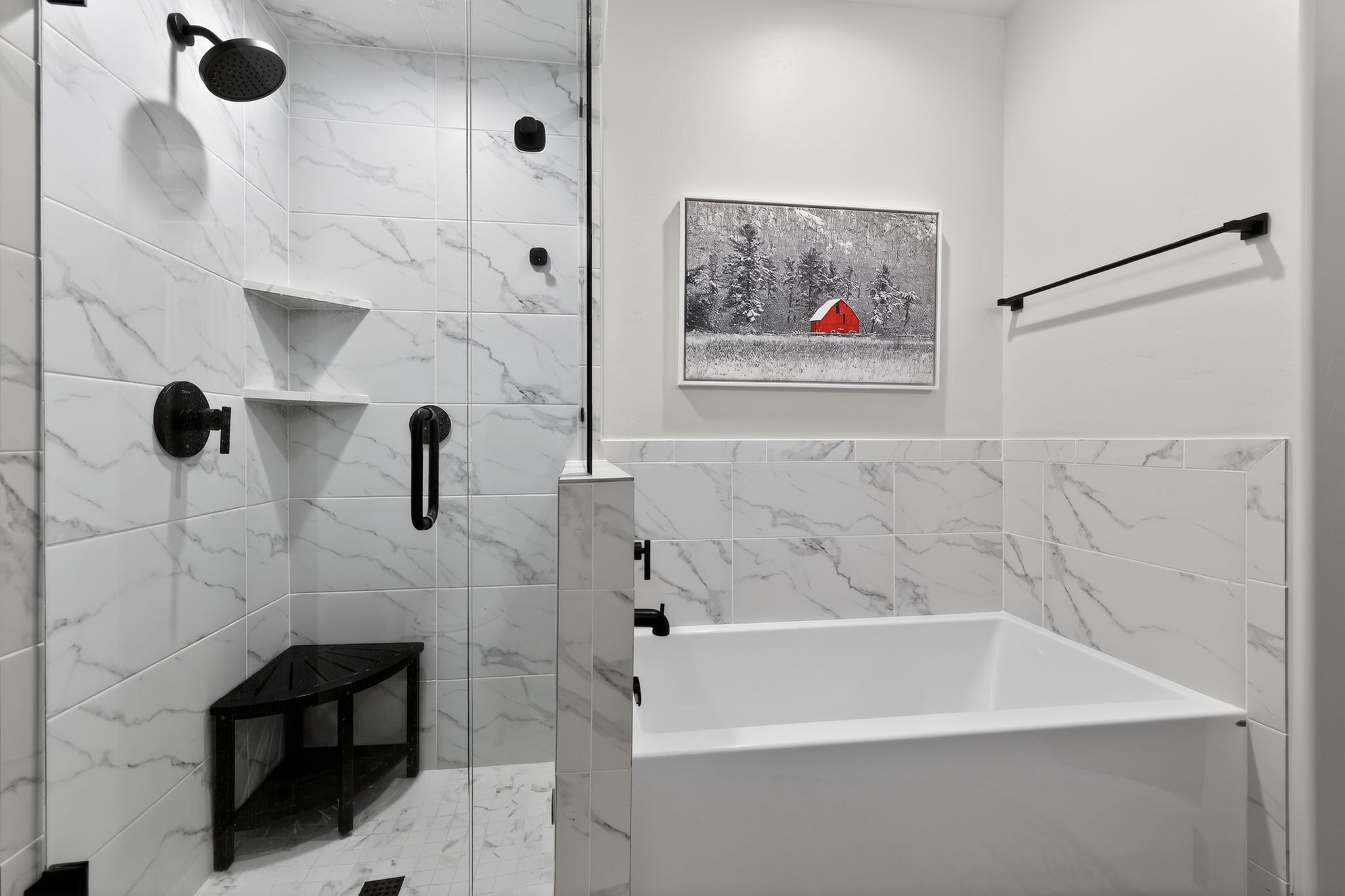 Contemporary bathroom featuring a walk-in shower with clear glass enclosure and a built-in tub with tile surround