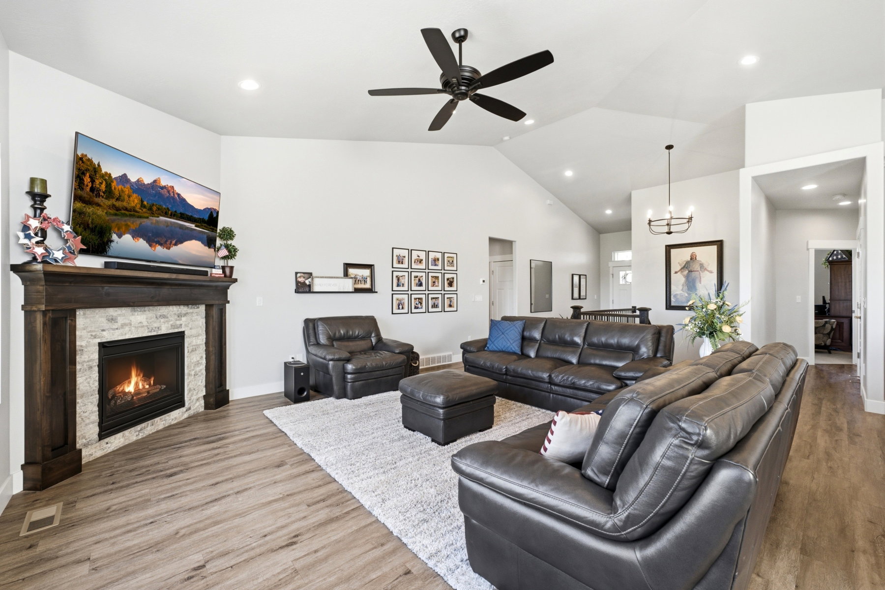 Great room with vaulted ceilings with cozy fireplace