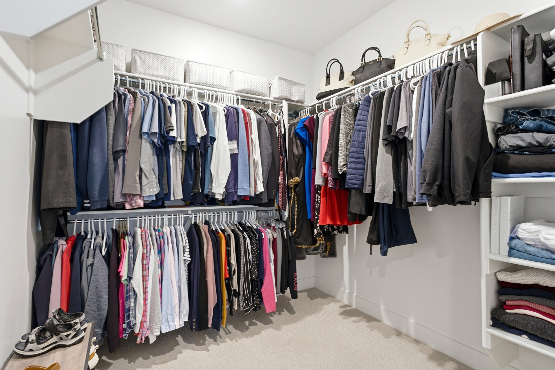 Primary bedroom walk-in closet